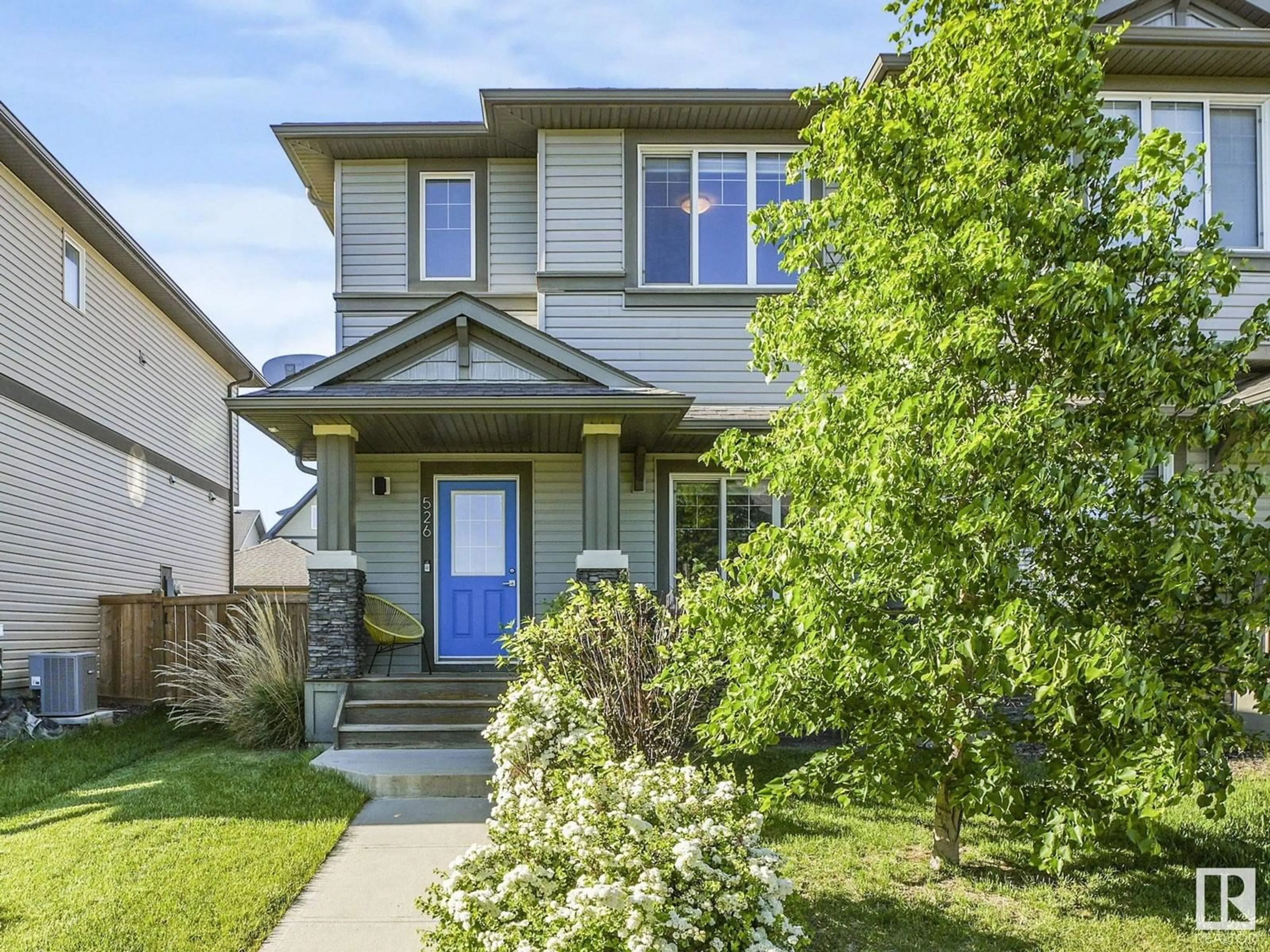 Home with vinyl exterior material, street for 526 SECORD BV, Edmonton Alberta T5T7B8