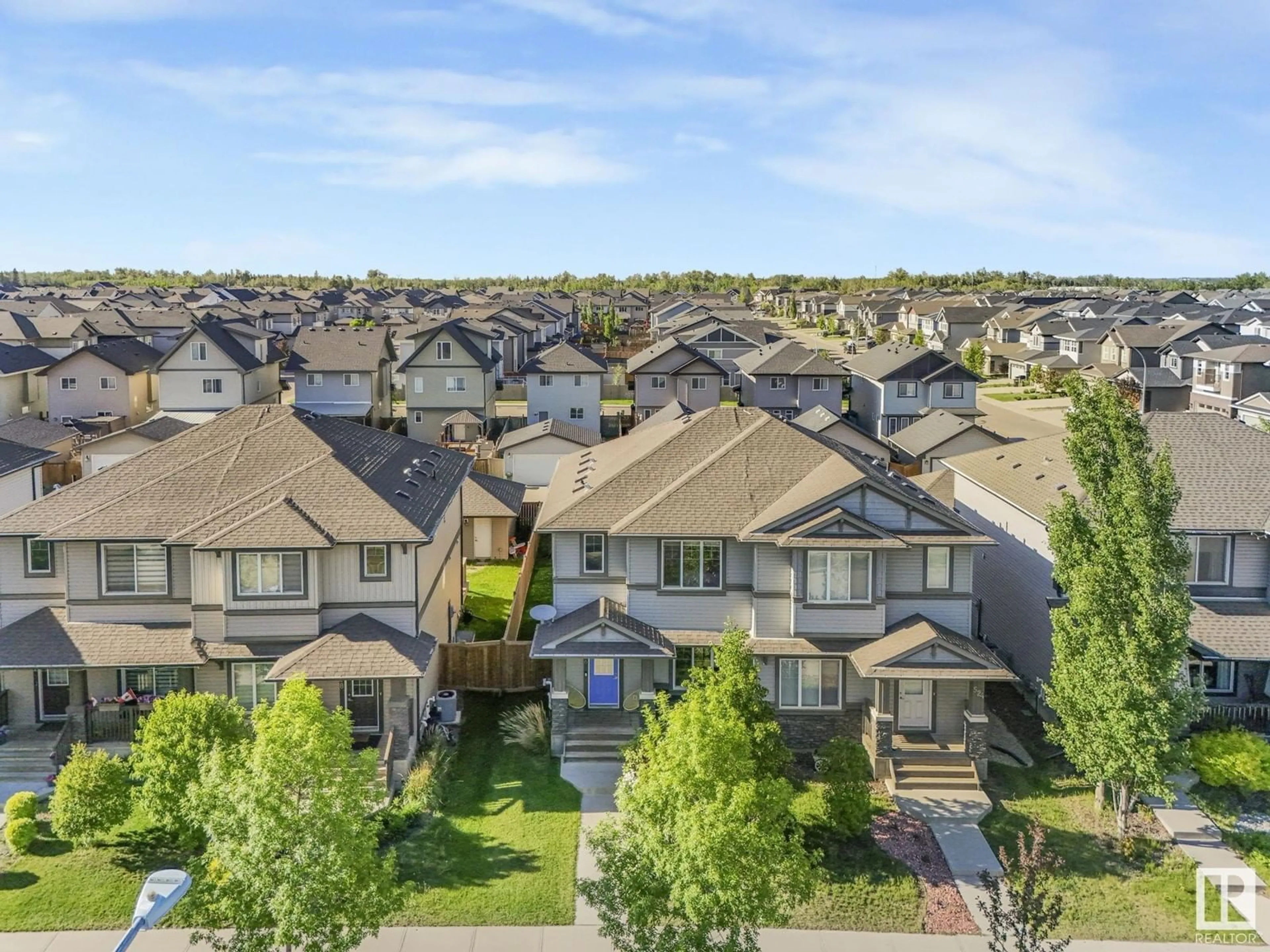 A pic from outside/outdoor area/front of a property/back of a property/a pic from drone, mountain view for 526 SECORD BV, Edmonton Alberta T5T7B8
