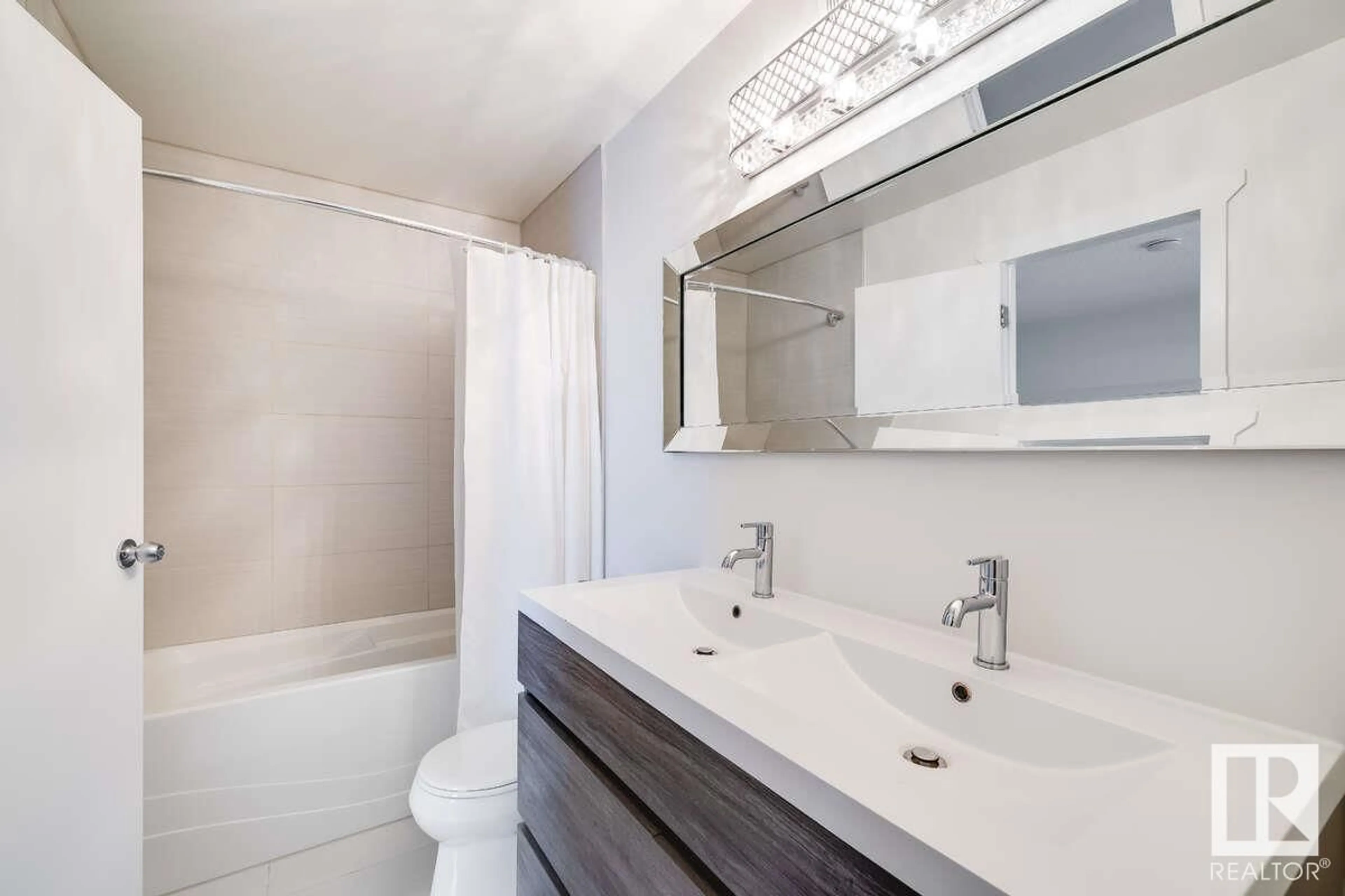 Standard bathroom, ceramic/tile floor for 2306 151 AV, Edmonton Alberta T5Y2L1