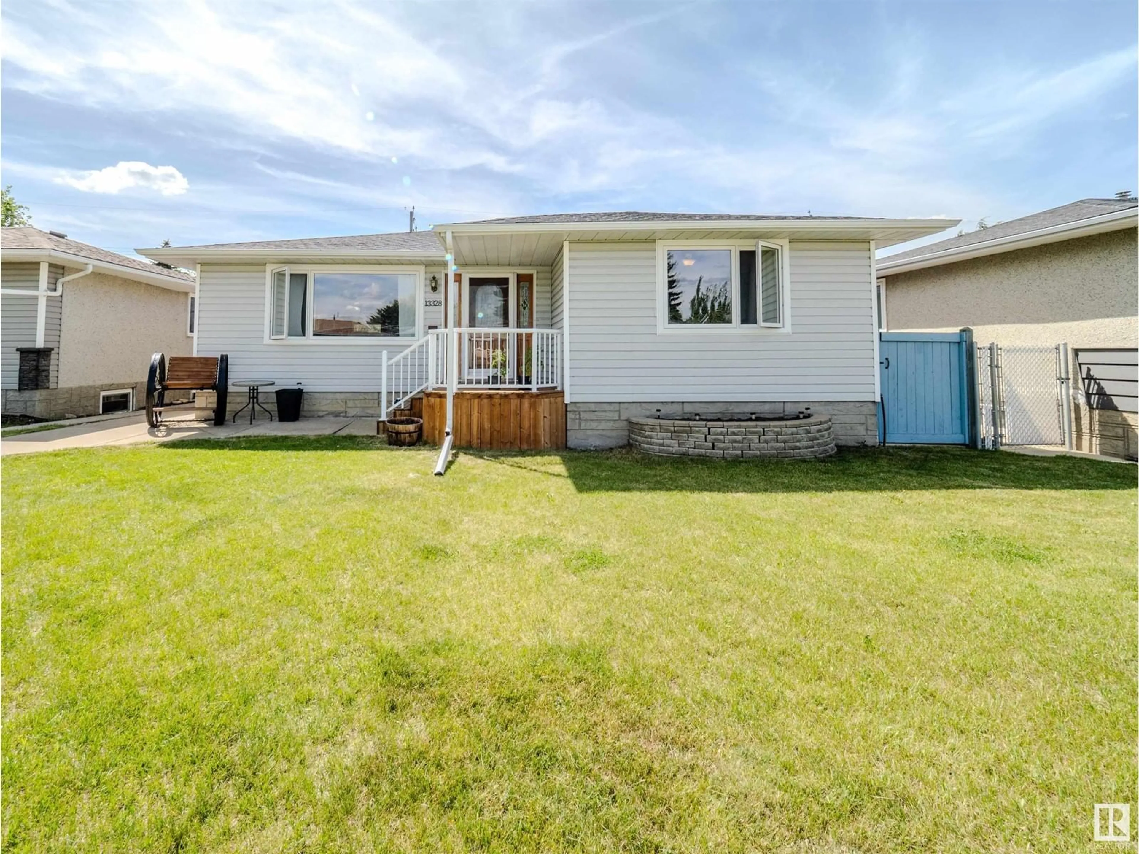 Home with vinyl exterior material, street for NW - 13328 123 ST, Edmonton Alberta T5L0J9