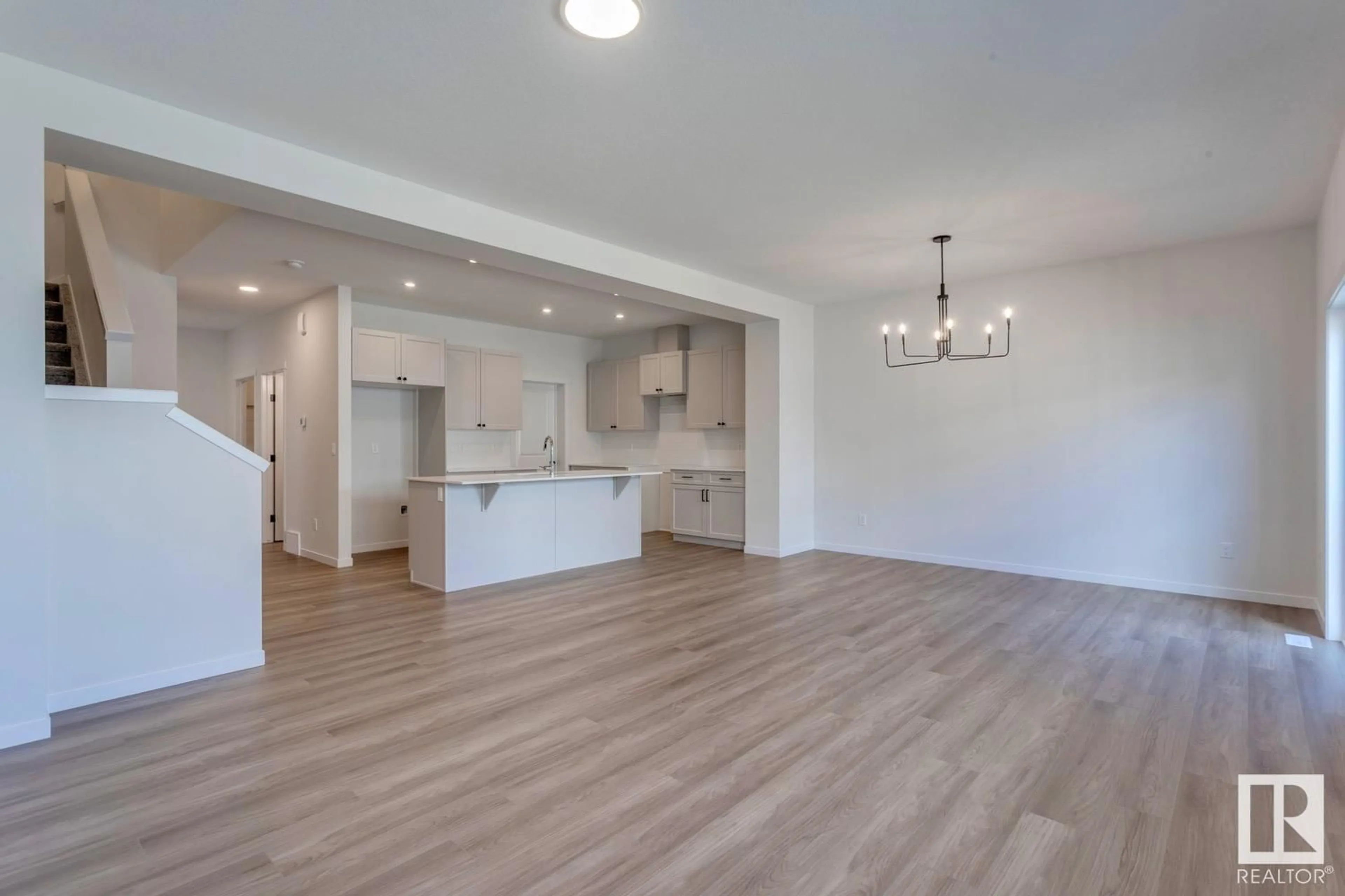 Open concept kitchen, wood/laminate floor for 75 NETTLE CR, St. Albert Alberta T8N8B1