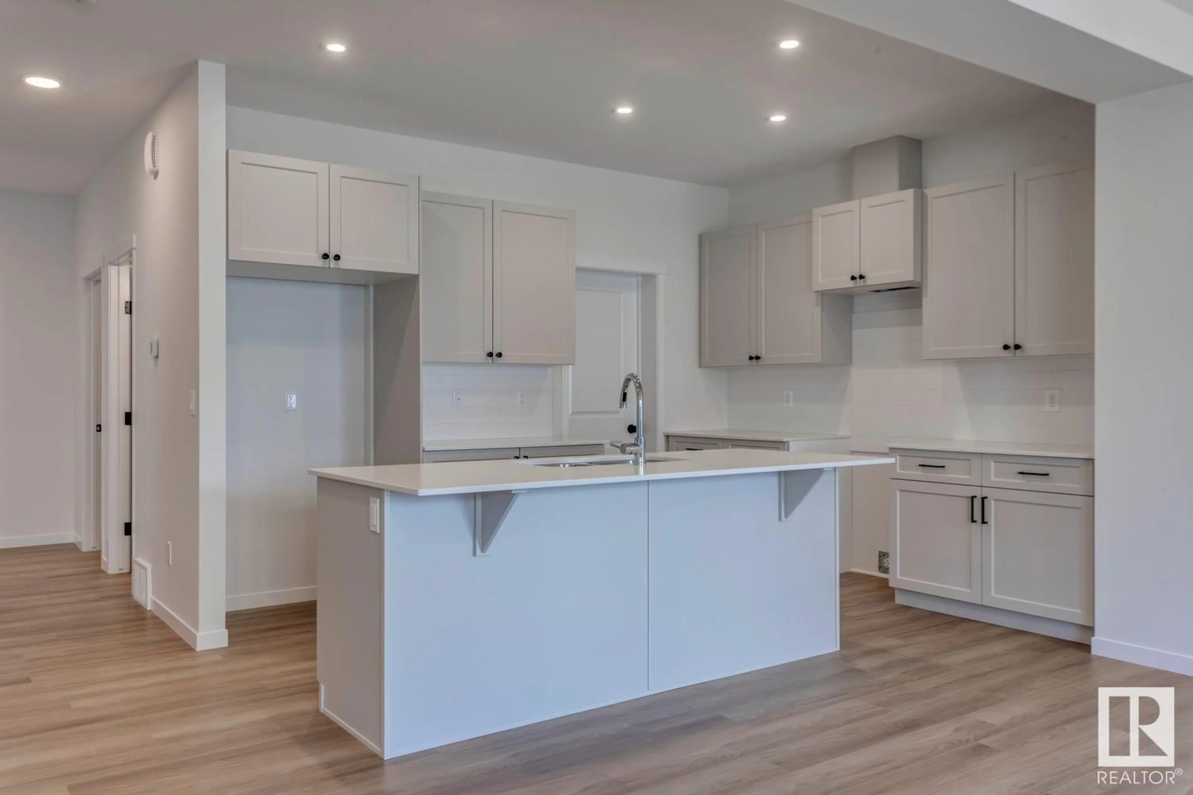 Open concept kitchen, wood/laminate floor for 75 NETTLE CR, St. Albert Alberta T8N8B1