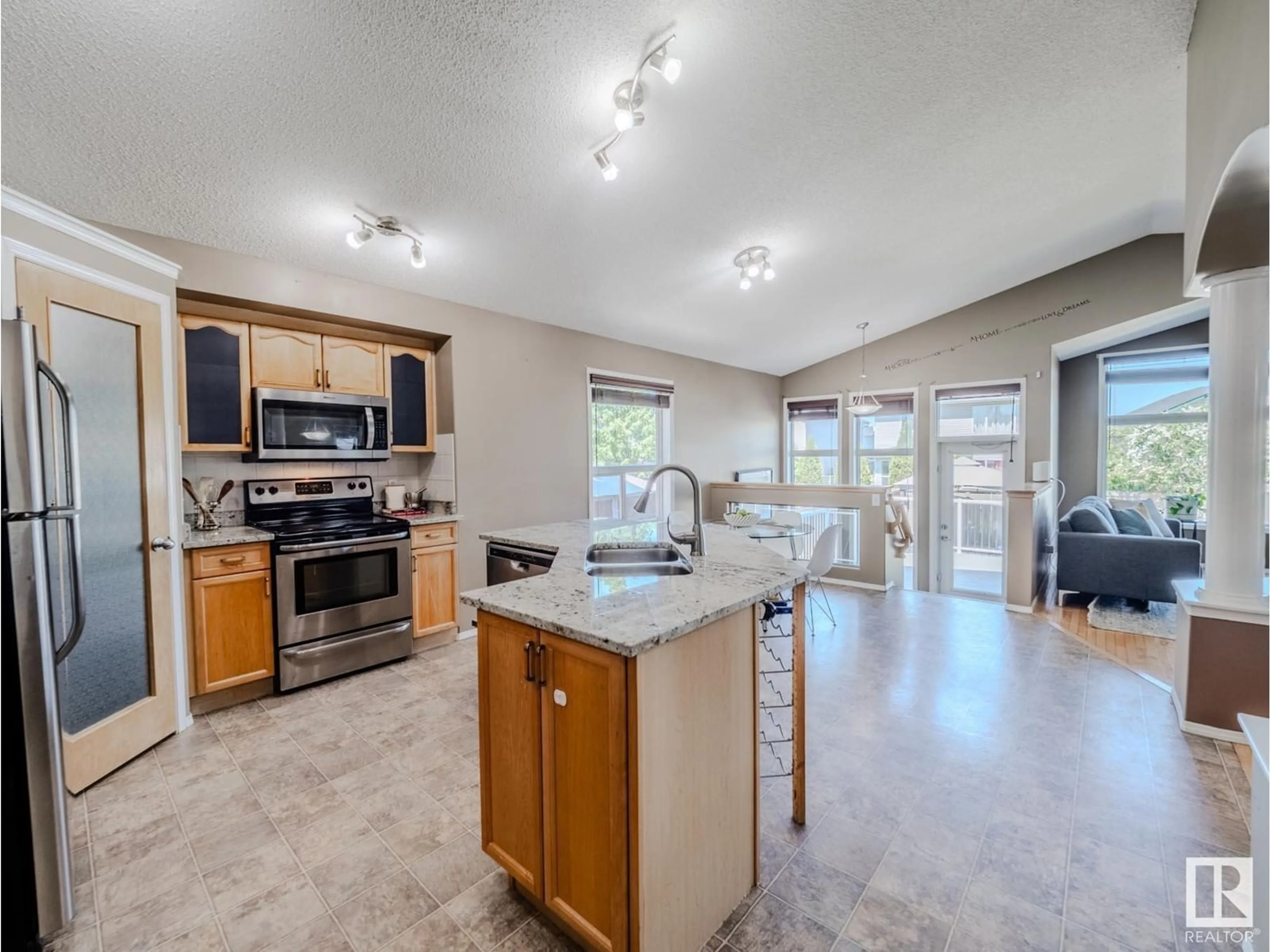 Open concept kitchen, ceramic/tile floor for NW - 21234 88A AV, Edmonton Alberta T5T6V2