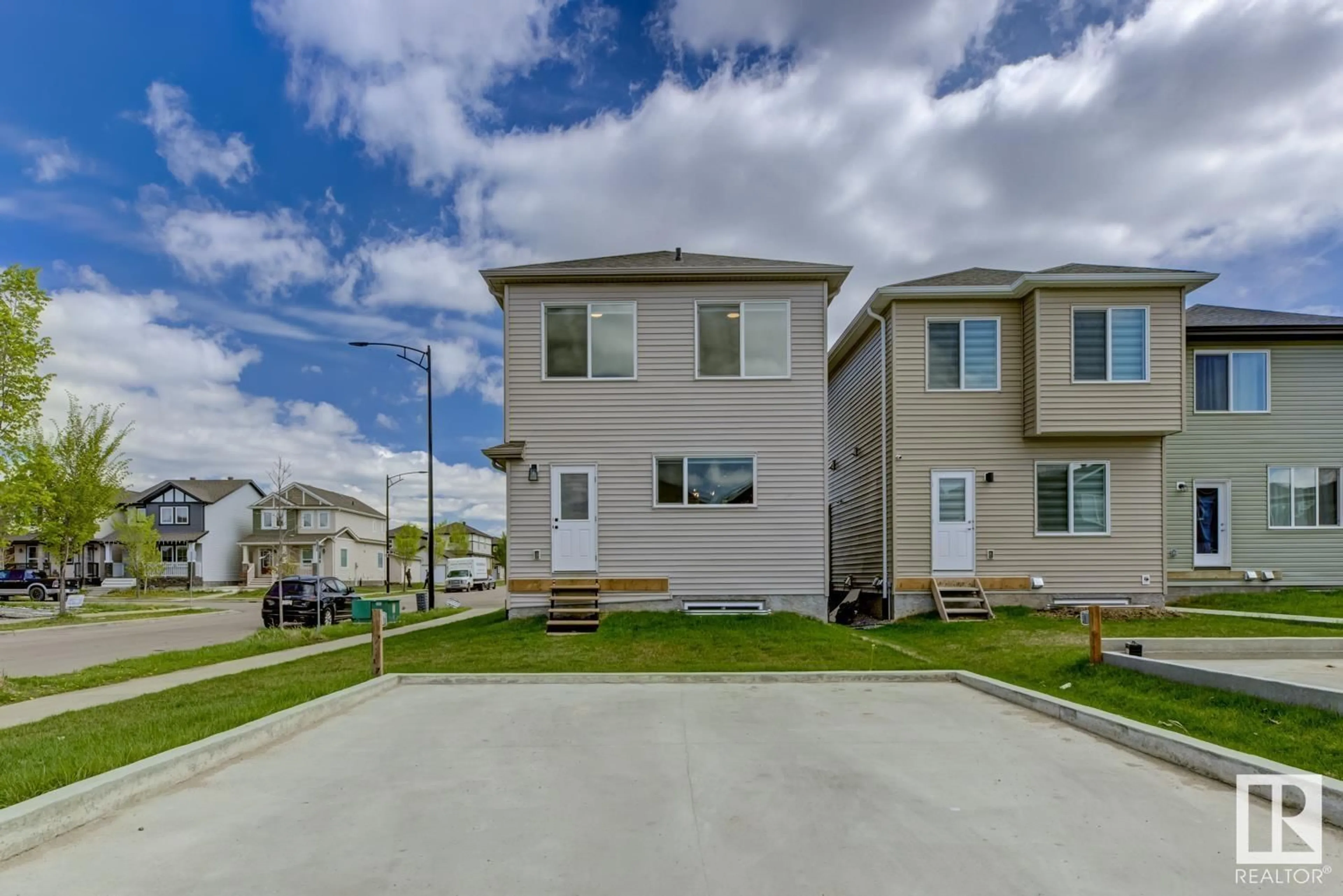 Home with vinyl exterior material, street for NW - 1472 22 ST, Edmonton Alberta T6T2R4