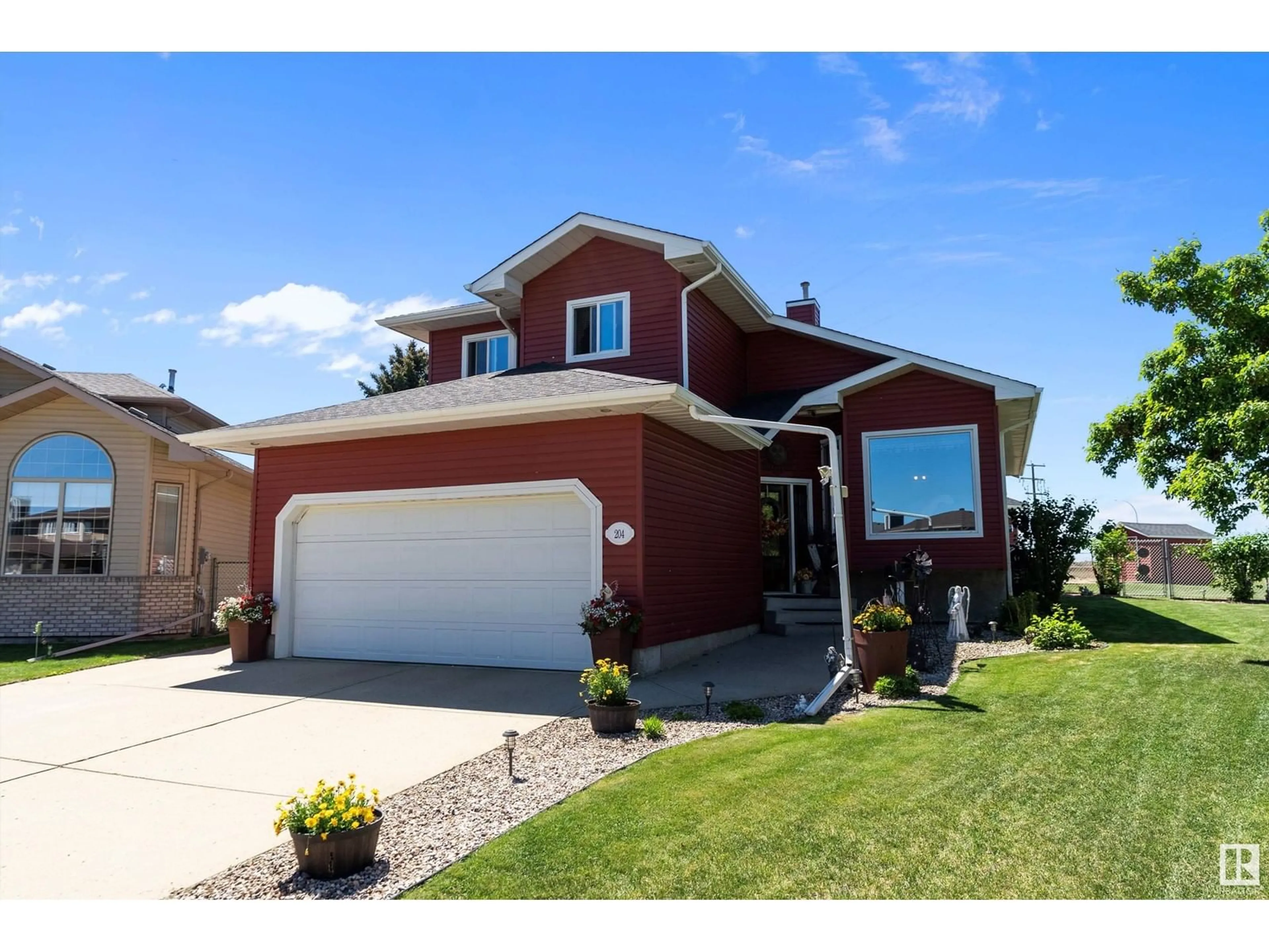 Home with brick exterior material, street for 204 WEST LIBERTY CR, Millet Alberta T0C1Z0