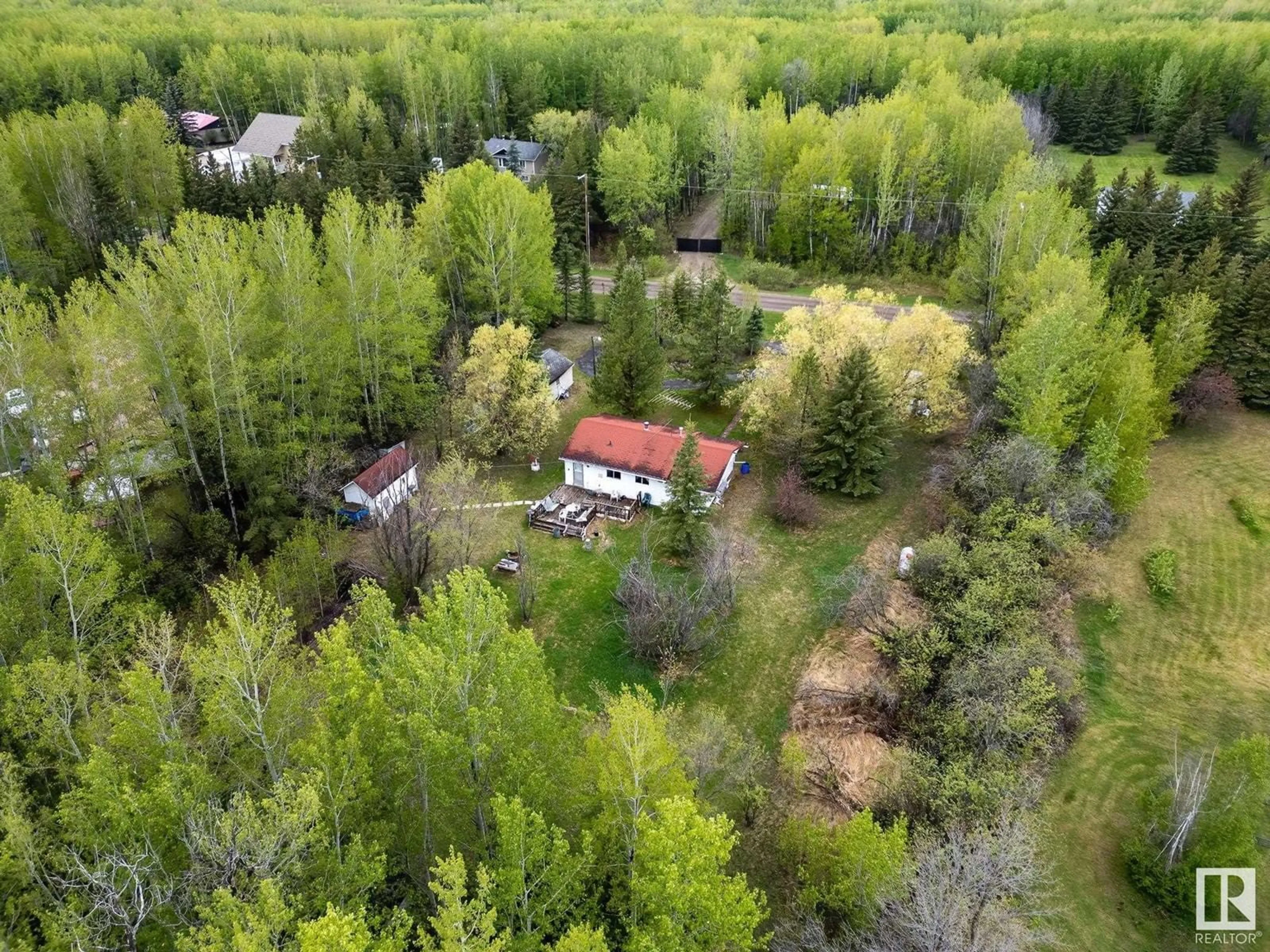 A pic from outside/outdoor area/front of a property/back of a property/a pic from drone, forest/trees view for 4402 22 ST, Rural Wetaskiwin County Alberta T0C2C0