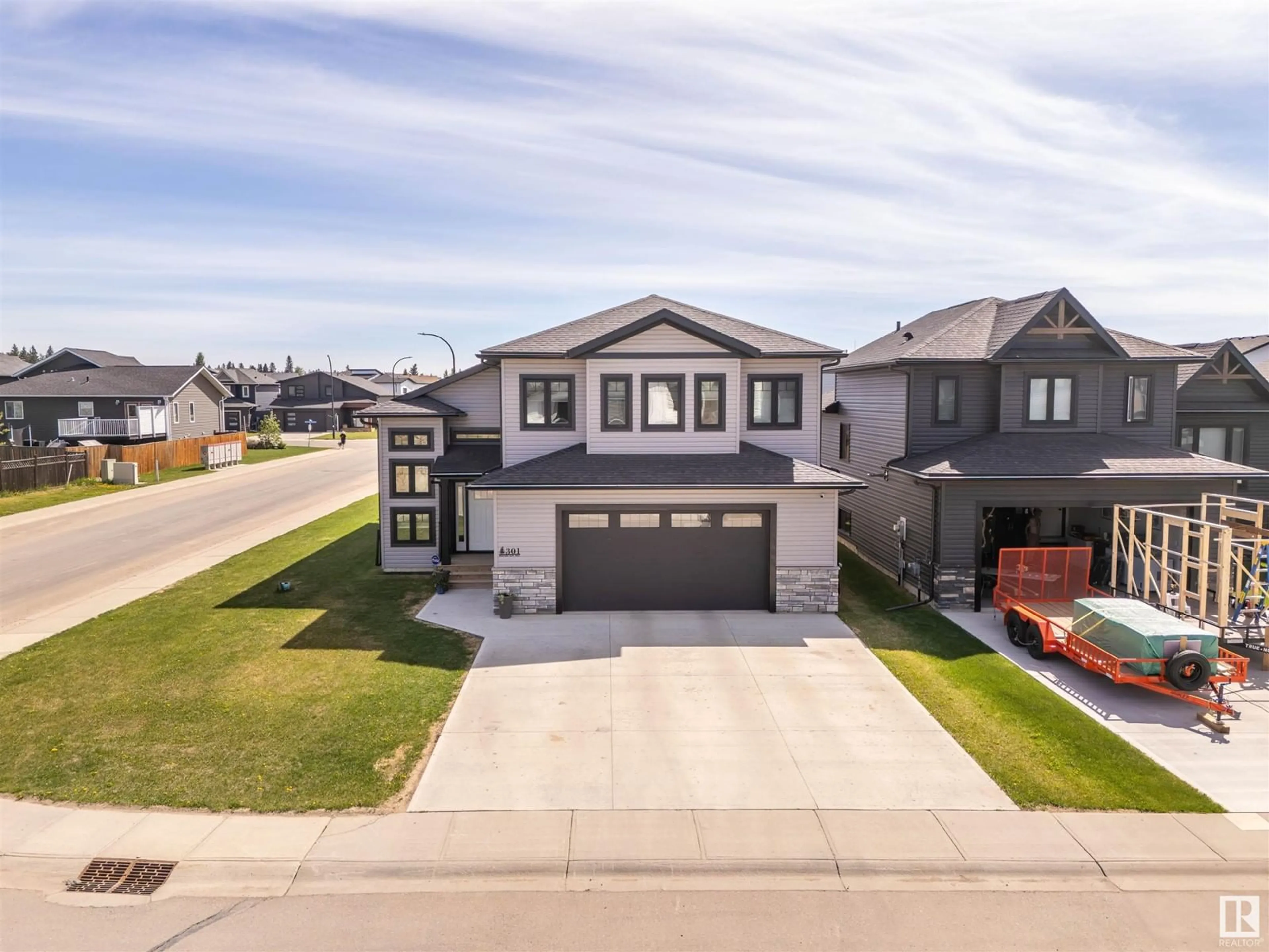 A pic from outside/outdoor area/front of a property/back of a property/a pic from drone, street for 301 WATERTON WY, Cold Lake Alberta T9M0L4