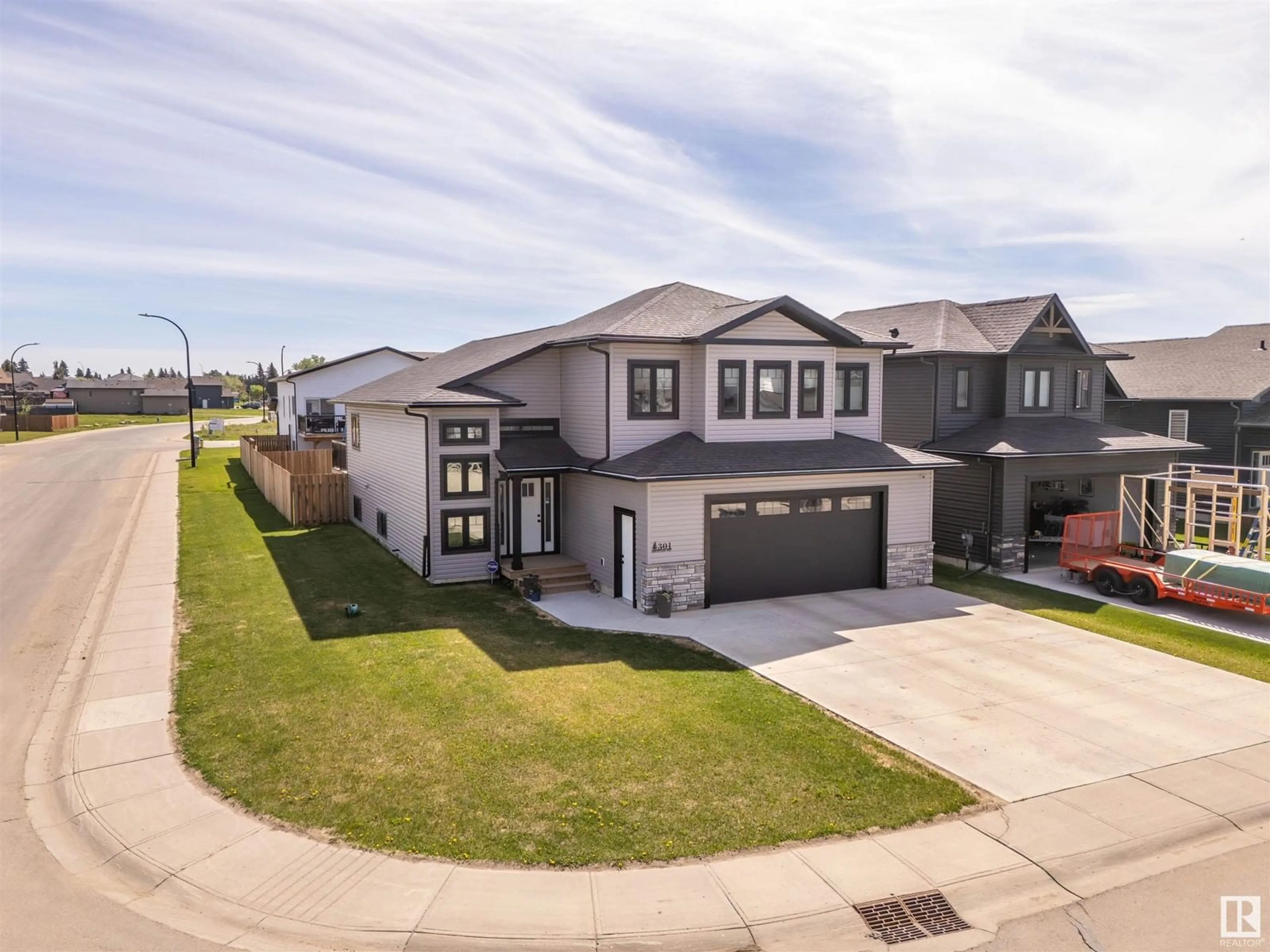 A pic from outside/outdoor area/front of a property/back of a property/a pic from drone, street for 301 WATERTON WY, Cold Lake Alberta T9M0L4