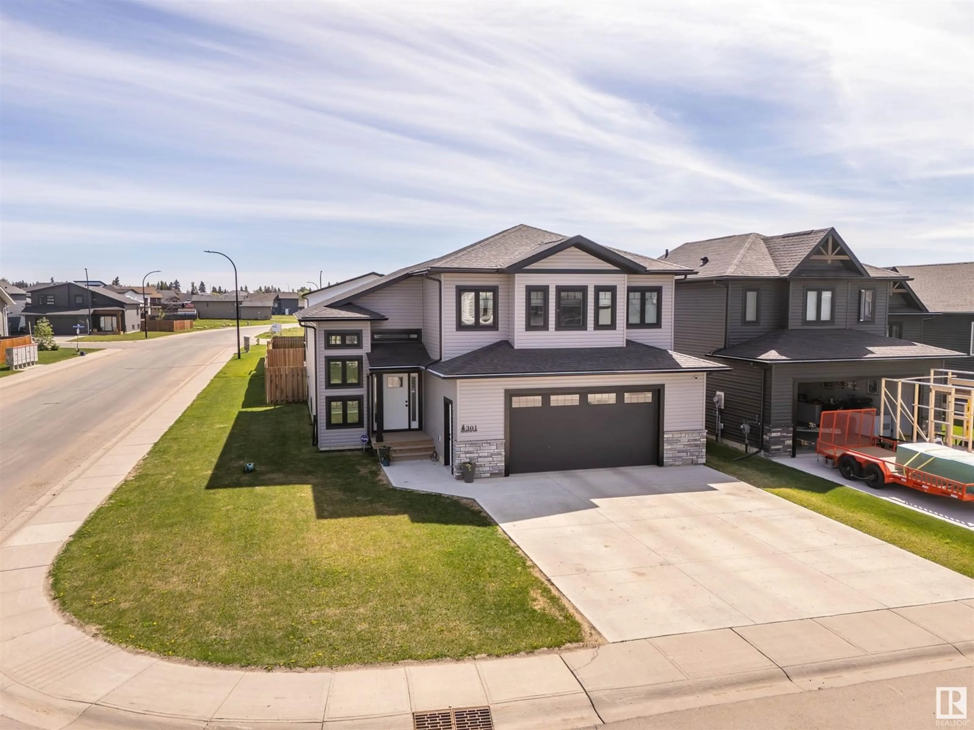 A pic from outside/outdoor area/front of a property/back of a property/a pic from drone, street for 301 WATERTON WY, Cold Lake Alberta T9M0L4