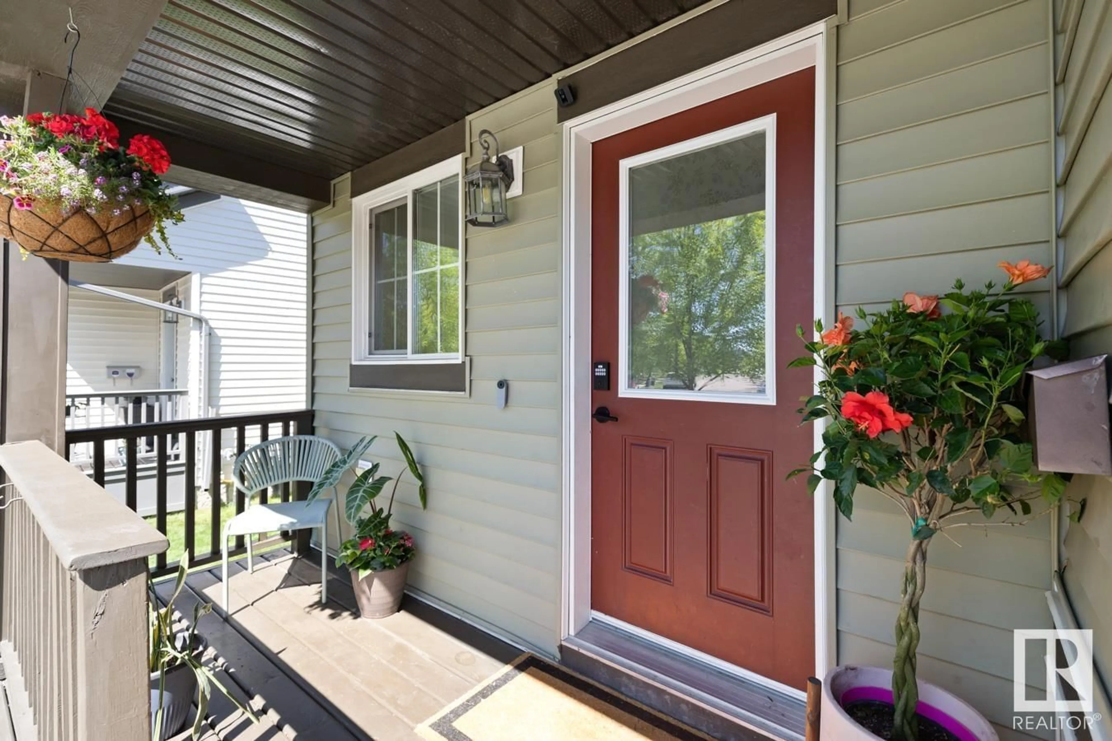 Home with vinyl exterior material, street for 6164 17 AV, Edmonton Alberta T6X0W1