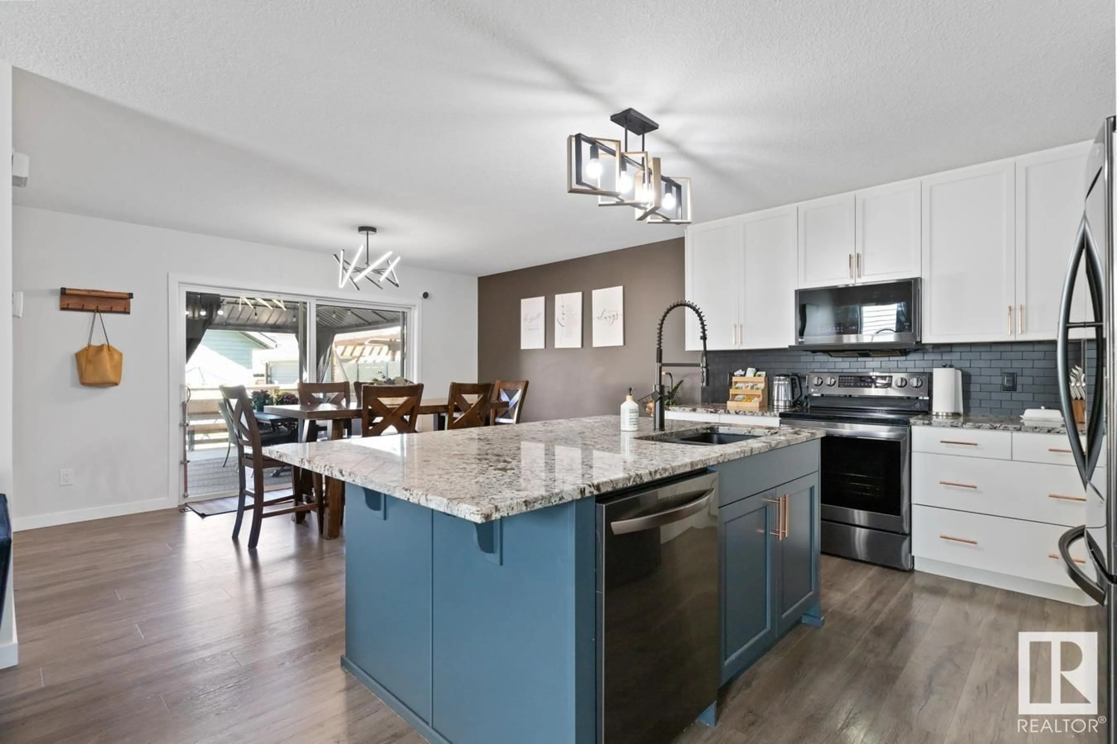 Open concept kitchen, ceramic/tile floor for 6164 17 AV, Edmonton Alberta T6X0W1