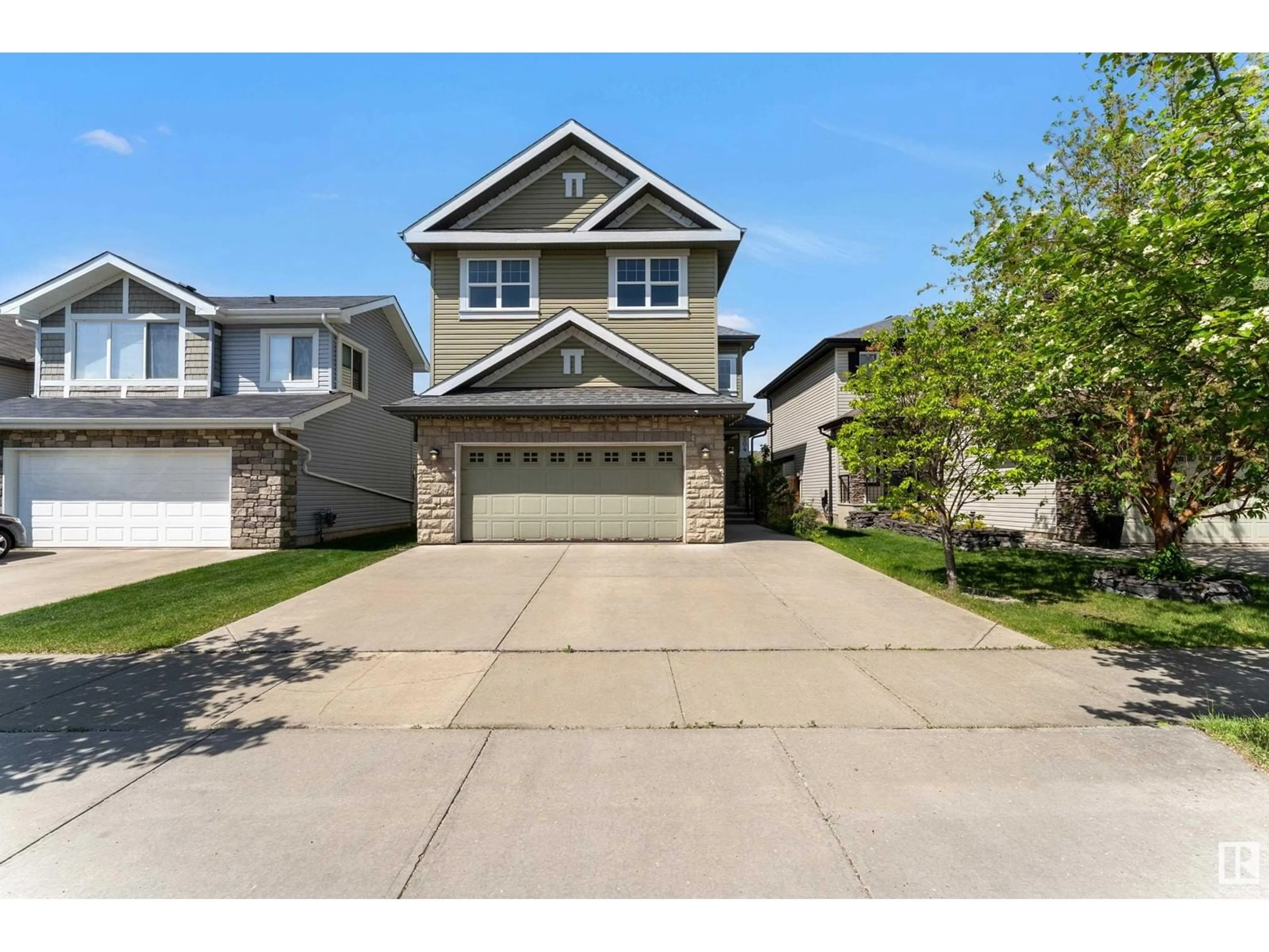 Home with vinyl exterior material, street for SW - 204 55 ST, Edmonton Alberta T6X0L1
