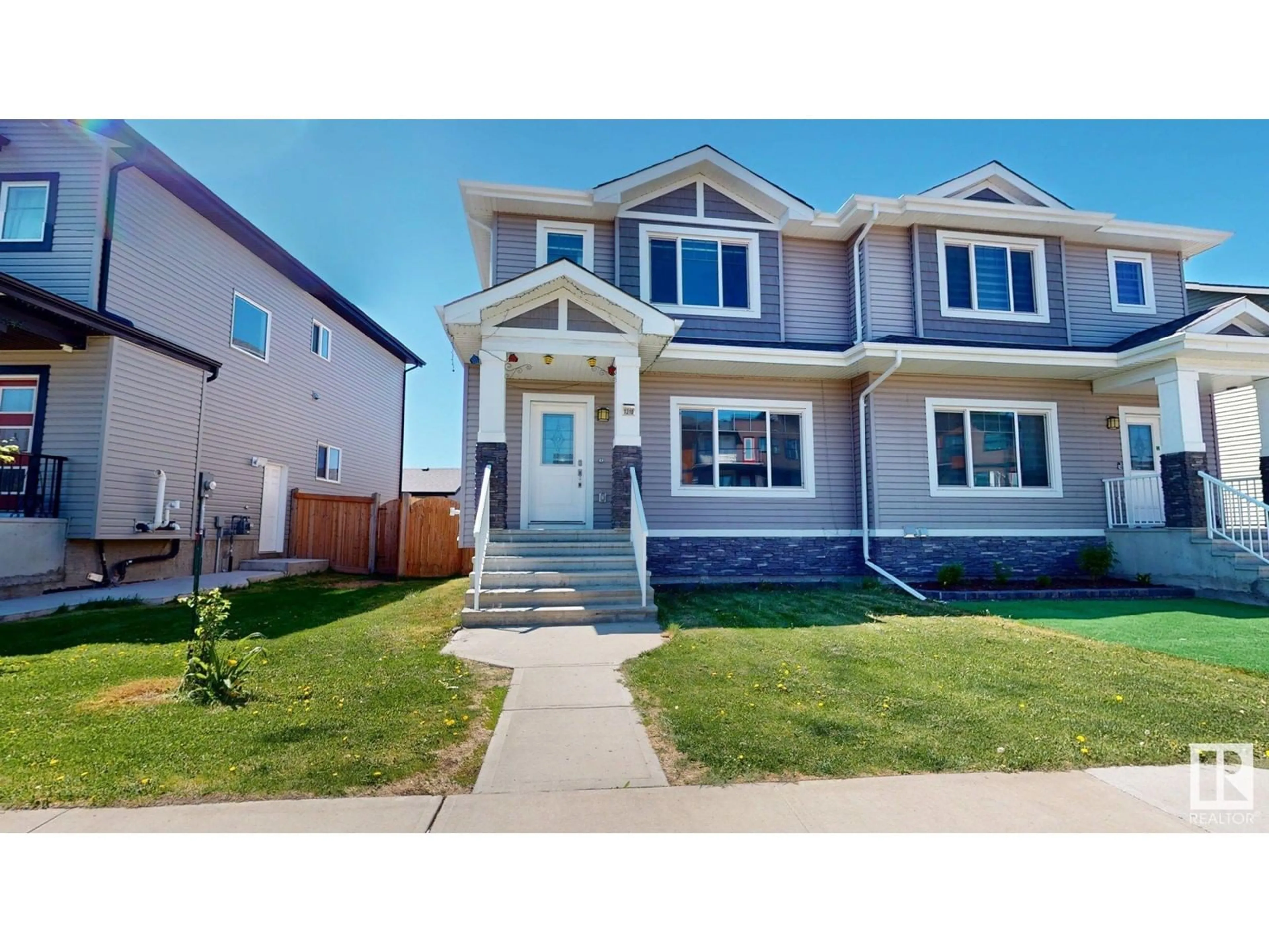 Home with vinyl exterior material, street for SW - 1210 163 ST, Edmonton Alberta T6W3K4