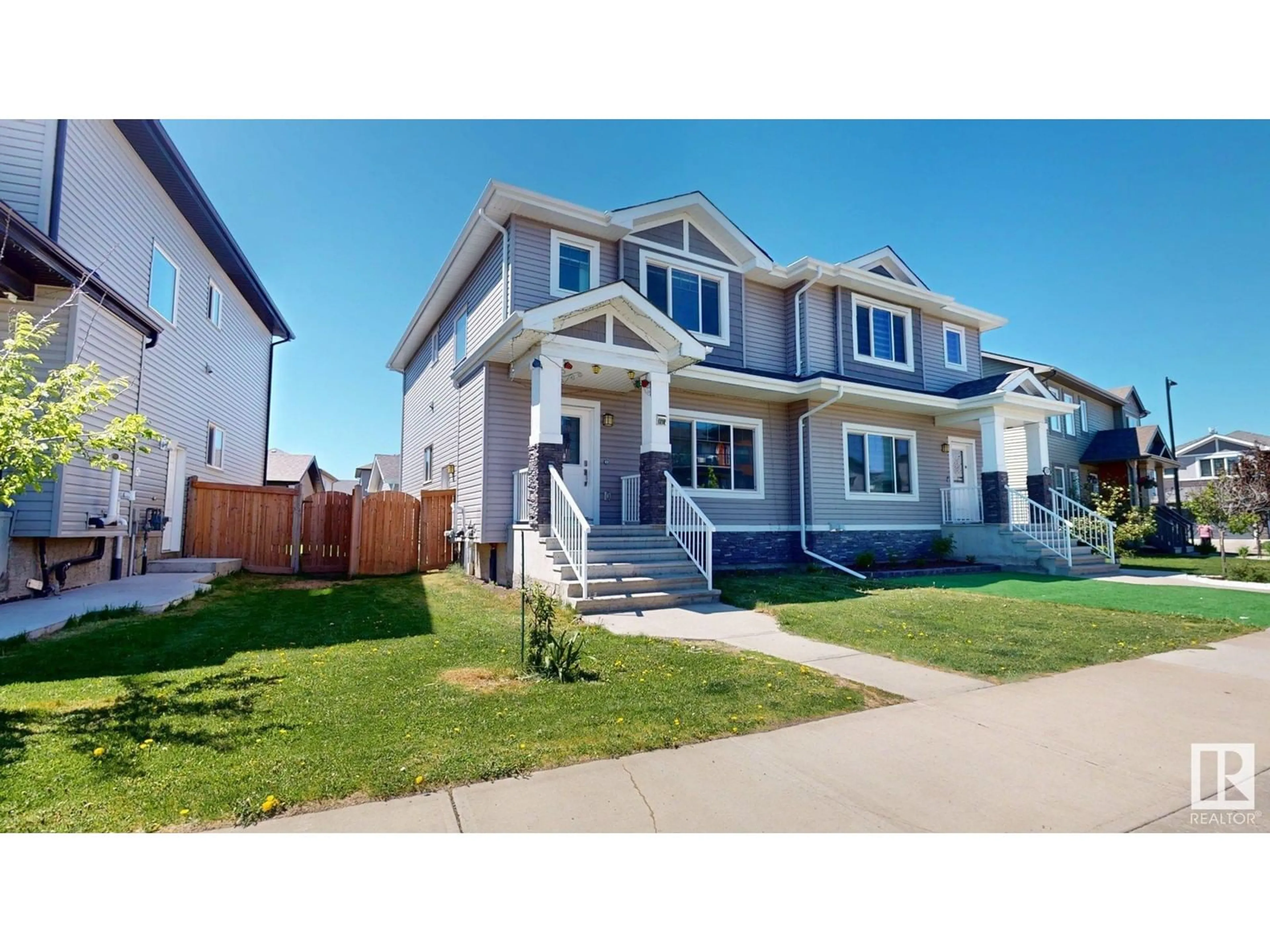 Home with vinyl exterior material, street for SW - 1210 163 ST, Edmonton Alberta T6W3K4
