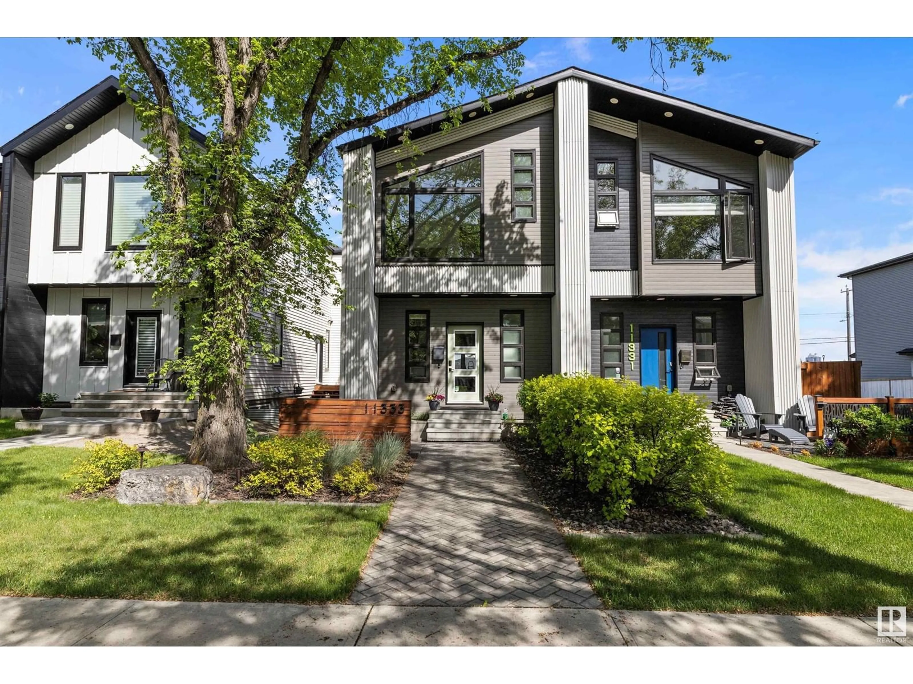 Home with vinyl exterior material, street for NW - 11333 122 ST, Edmonton Alberta T5M0B6
