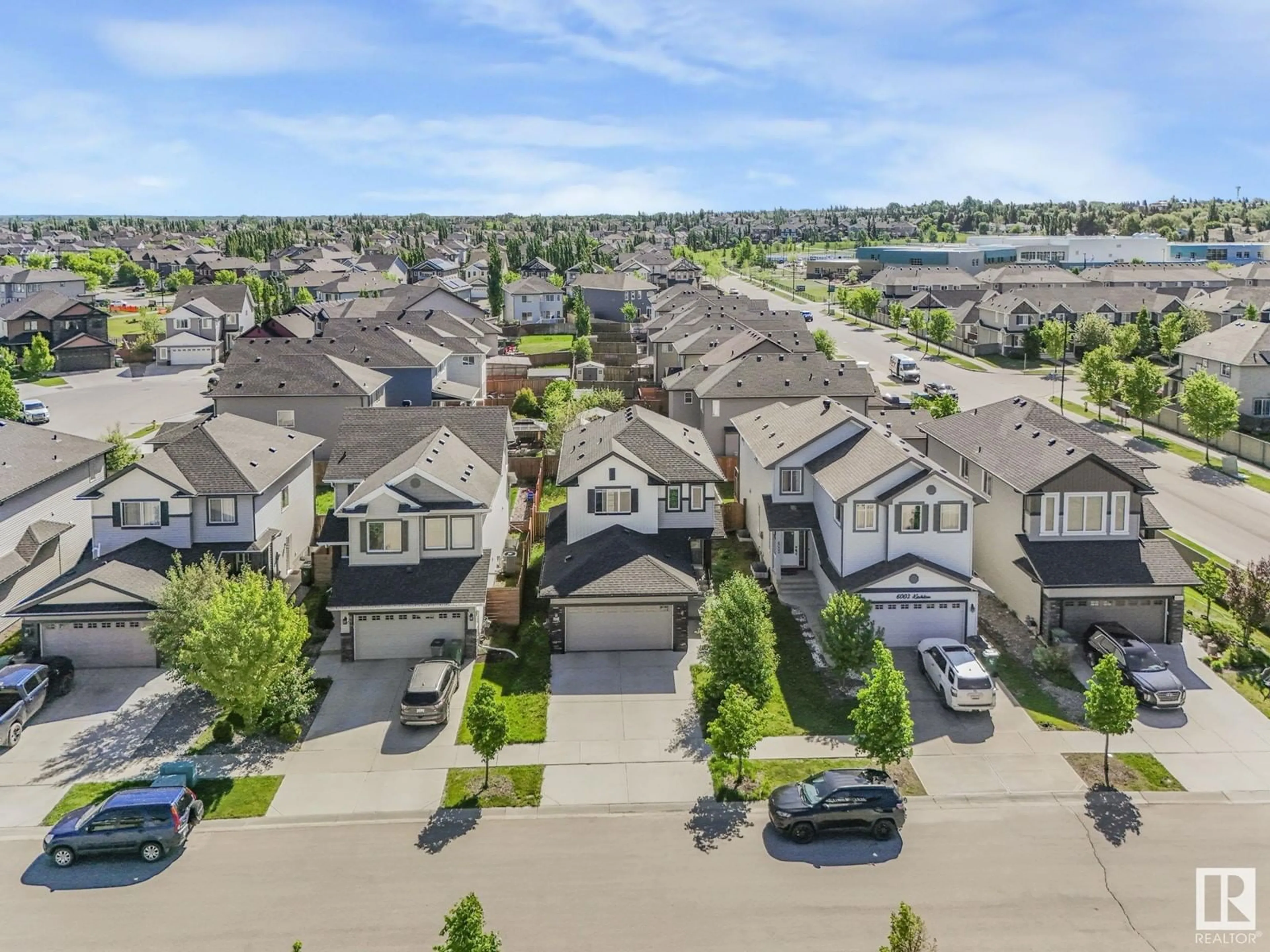 A pic from outside/outdoor area/front of a property/back of a property/a pic from drone, street for 6005 64 ST, Beaumont Alberta T4X1Z2