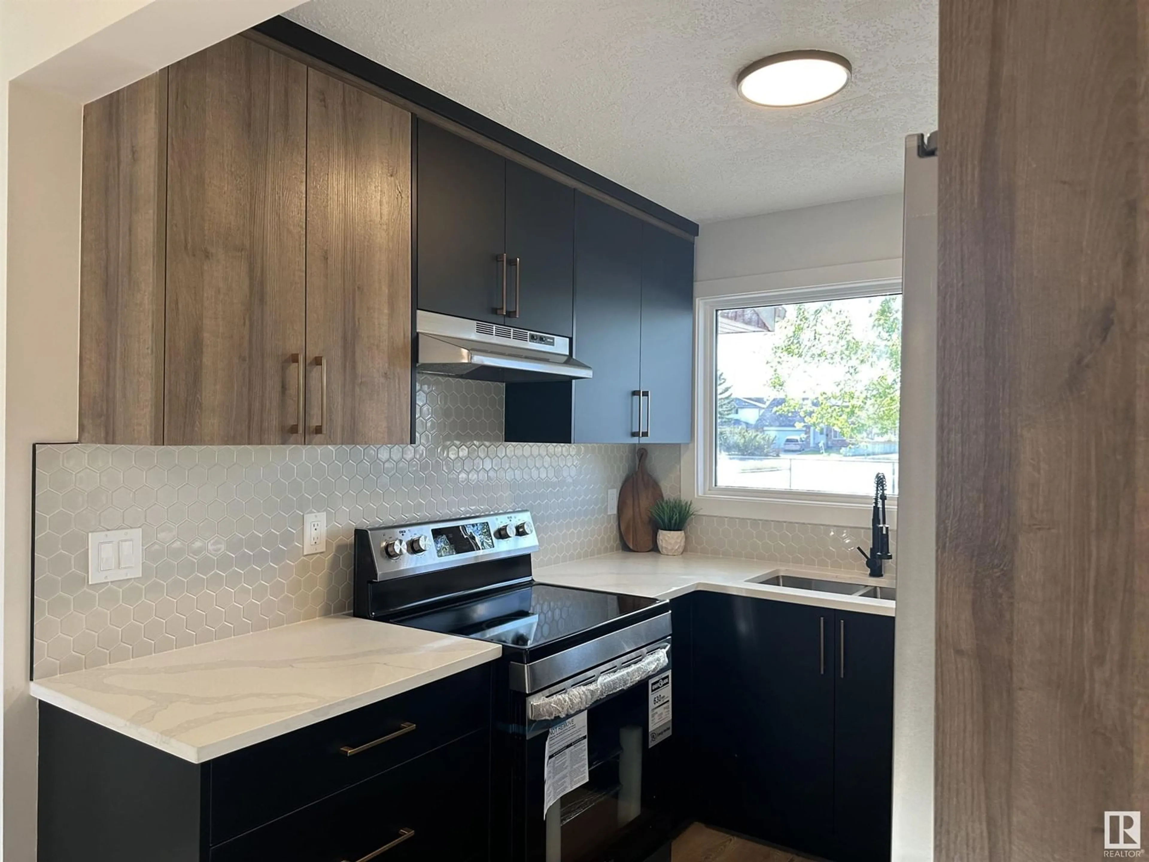 Standard kitchen, unknown for 10630 BEAUMARIS RD, Edmonton Alberta T5X3N4