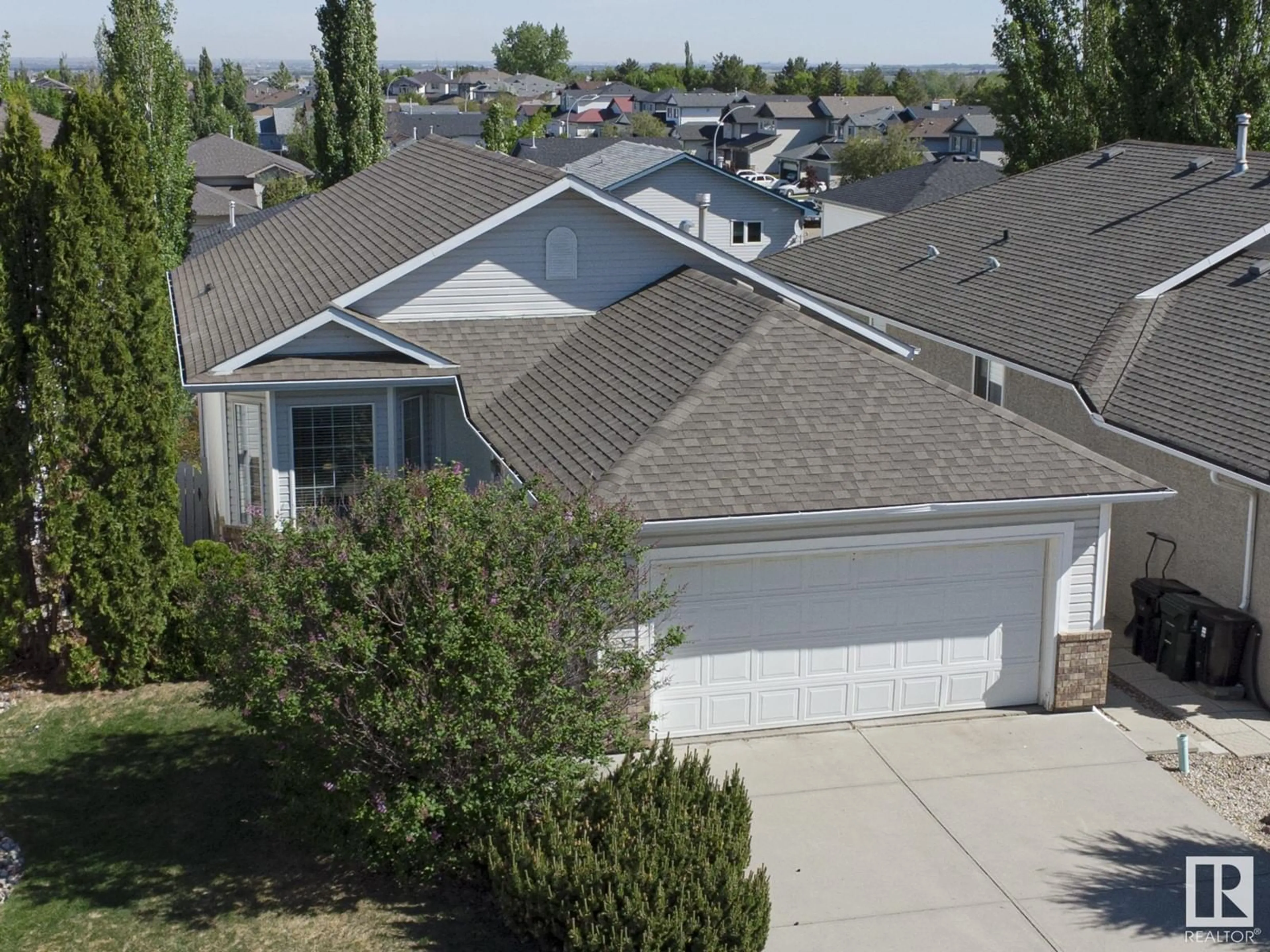 A pic from outside/outdoor area/front of a property/back of a property/a pic from drone, street for 290 LILAC TC, Sherwood Park Alberta T8H1Z2