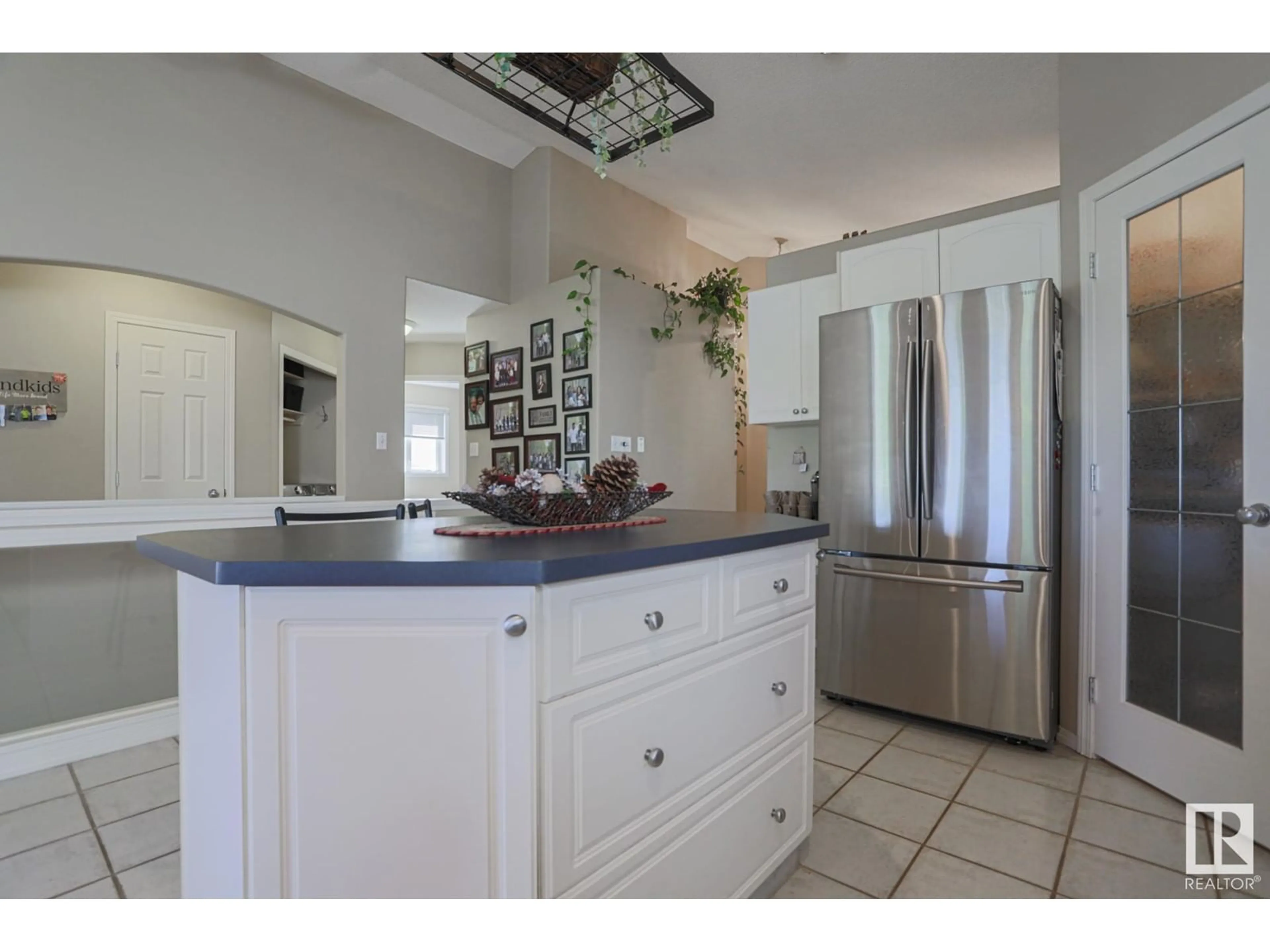 Open concept kitchen, ceramic/tile floor for 290 LILAC TC, Sherwood Park Alberta T8H1Z2