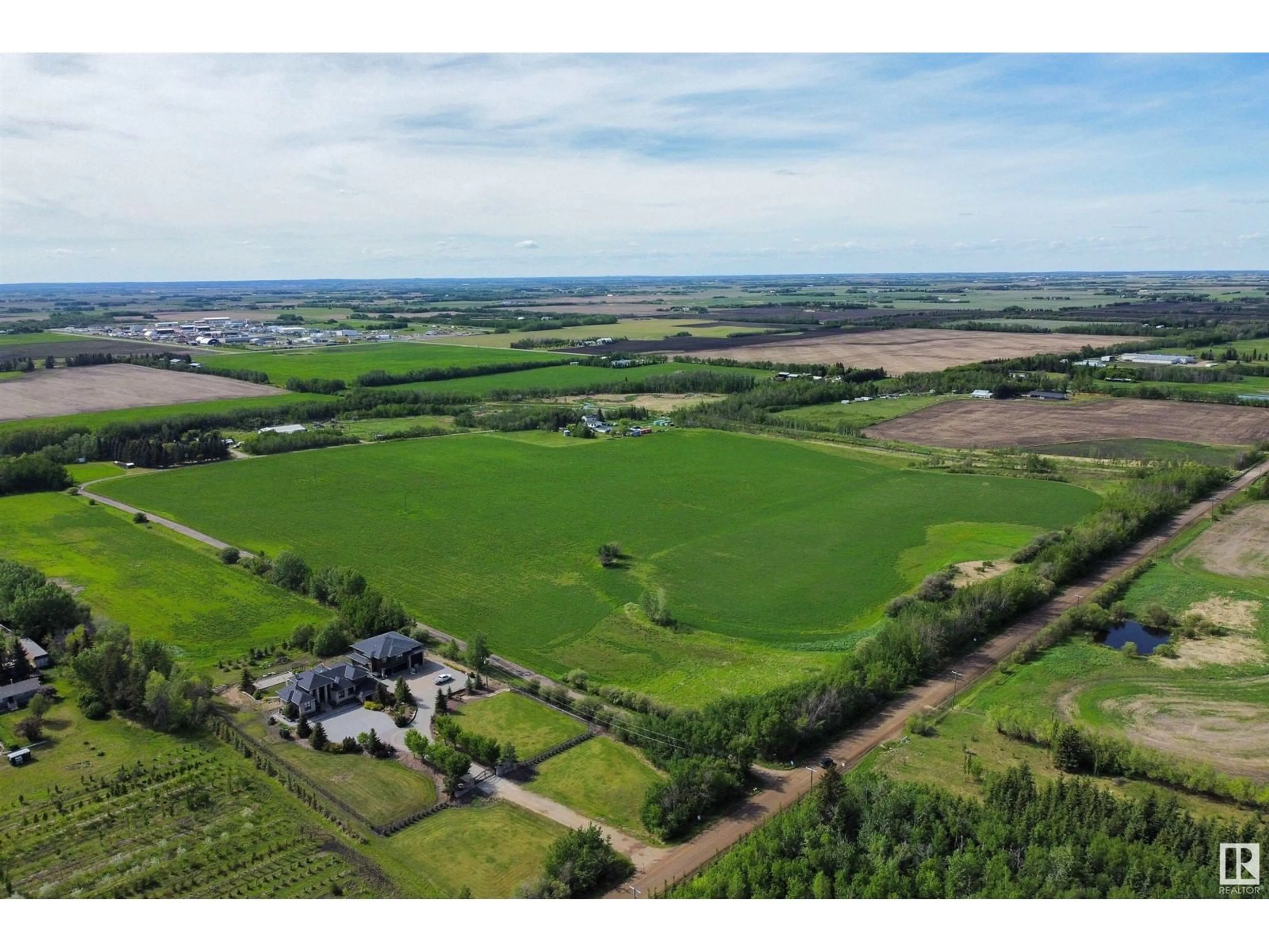 A pic from outside/outdoor area/front of a property/back of a property/a pic from drone, unknown for 54318 RGE RD 255, St. Albert Alberta T8T0T8