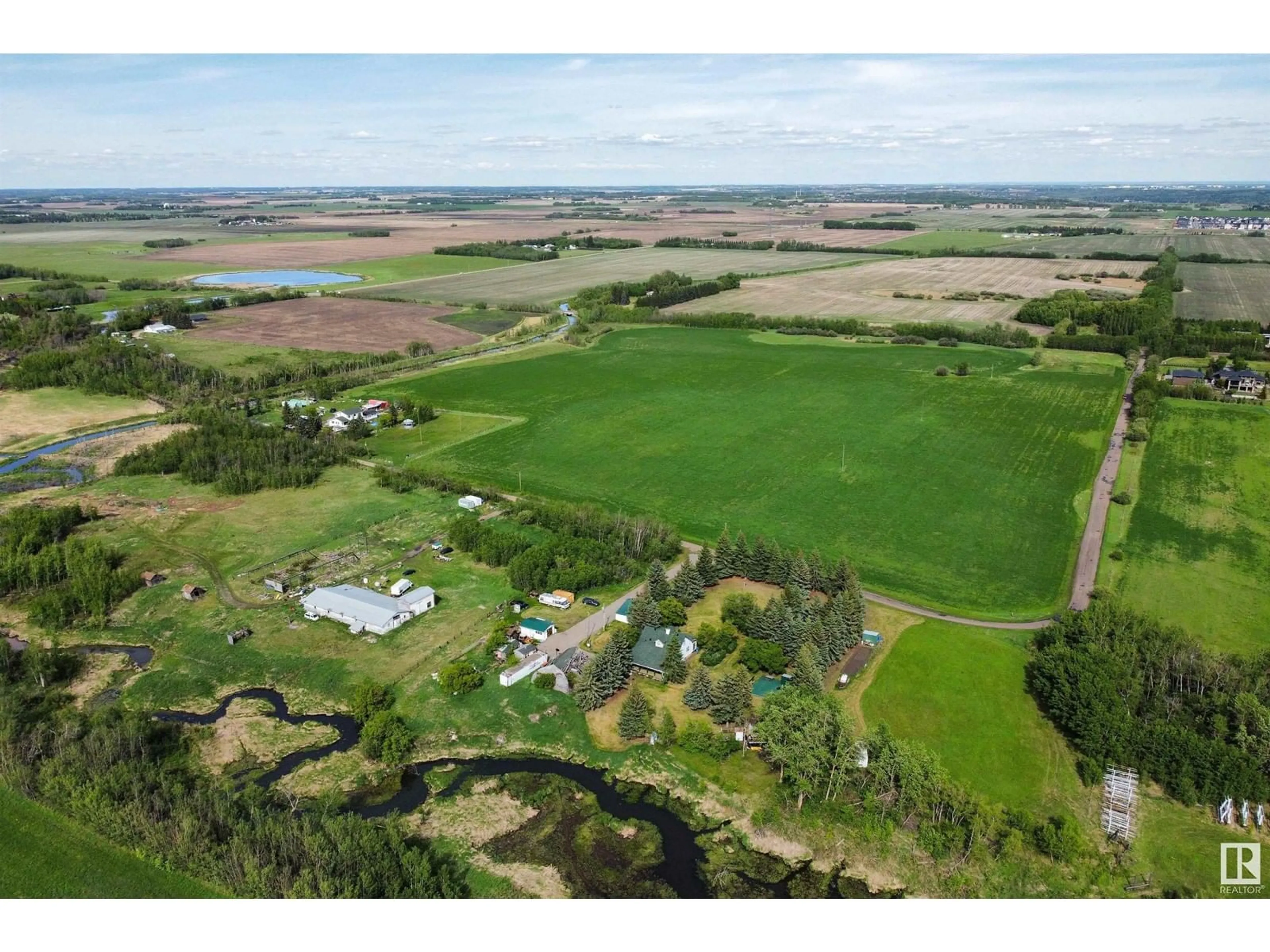 A pic from outside/outdoor area/front of a property/back of a property/a pic from drone, unknown for 54318 RGE RD 255, St. Albert Alberta T8T0T8