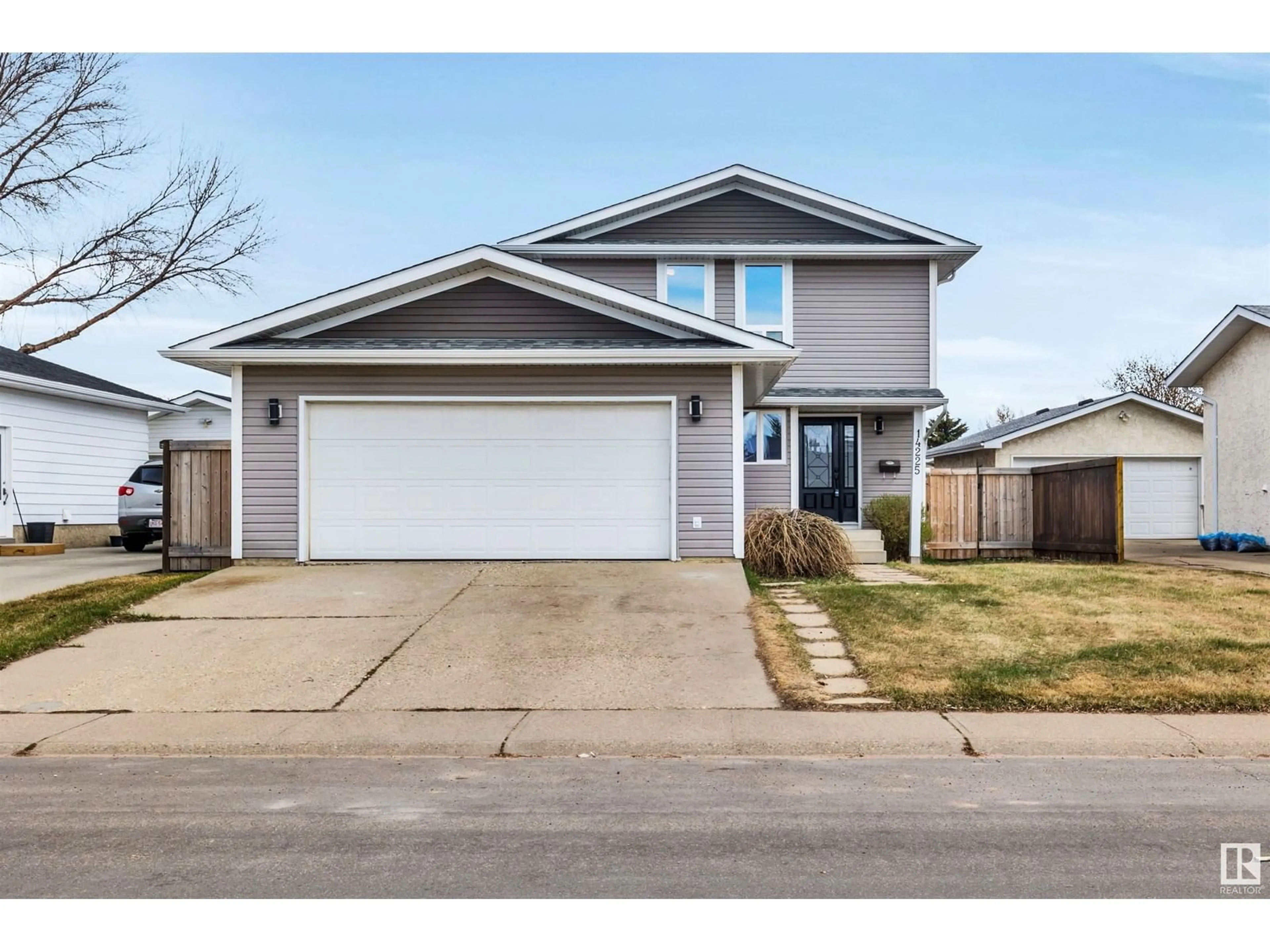 Home with vinyl exterior material, street for NW - 14225 24A ST, Edmonton Alberta T5Y1N7
