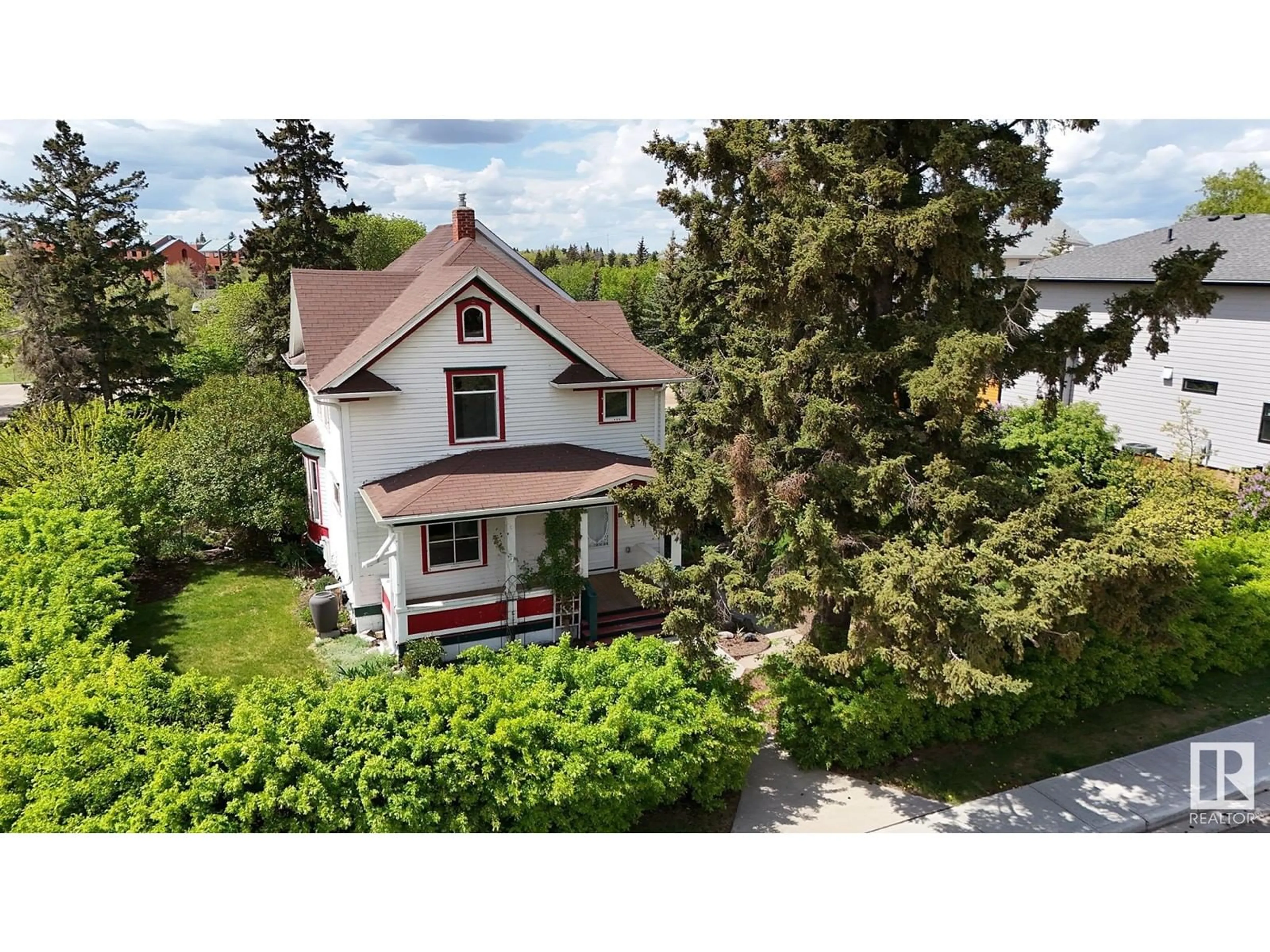 A pic from outside/outdoor area/front of a property/back of a property/a pic from drone, street for 4602 49 ST, Camrose Alberta T4V1M5