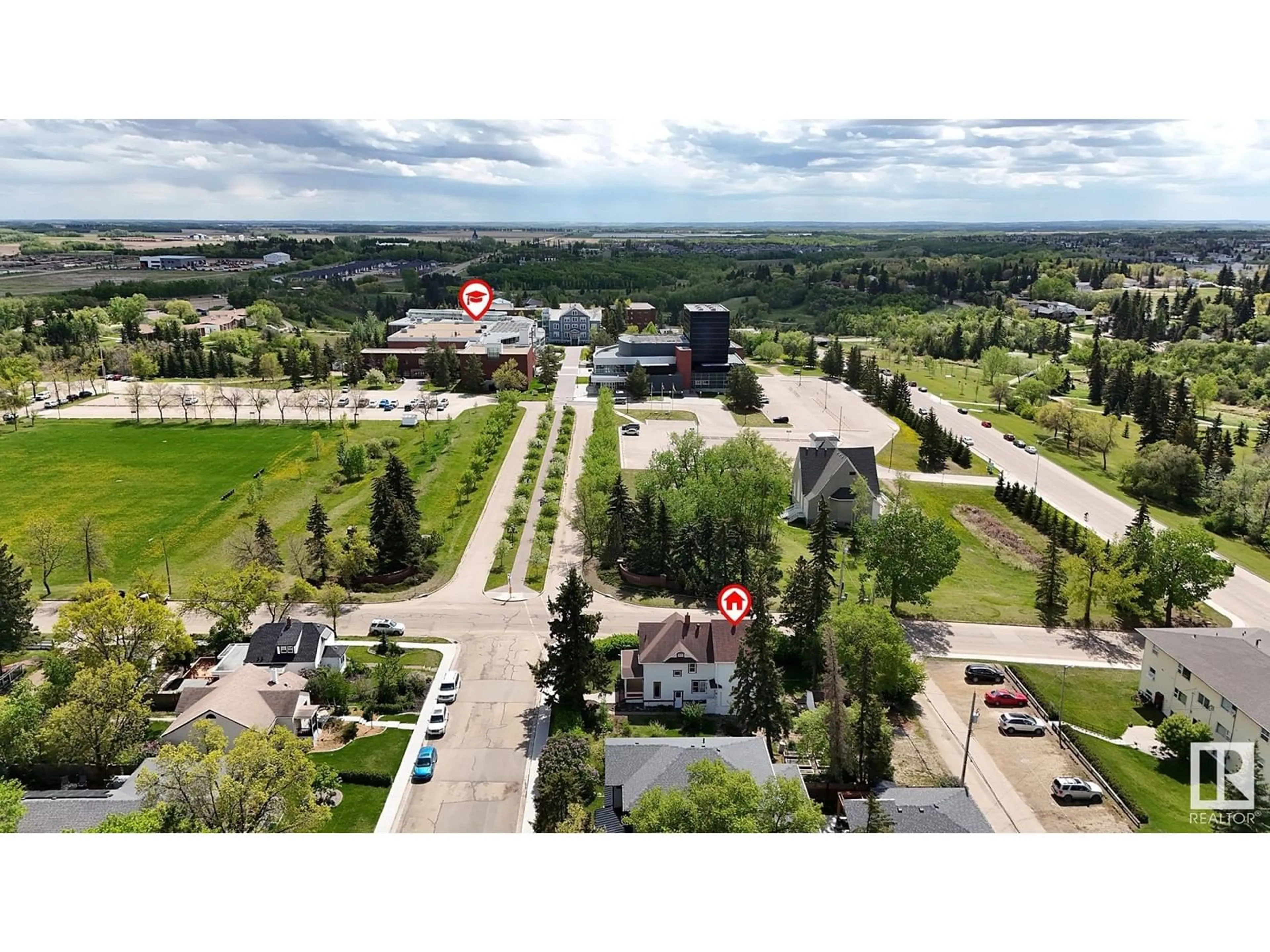 A pic from outside/outdoor area/front of a property/back of a property/a pic from drone, street for 4602 49 ST, Camrose Alberta T4V1M5