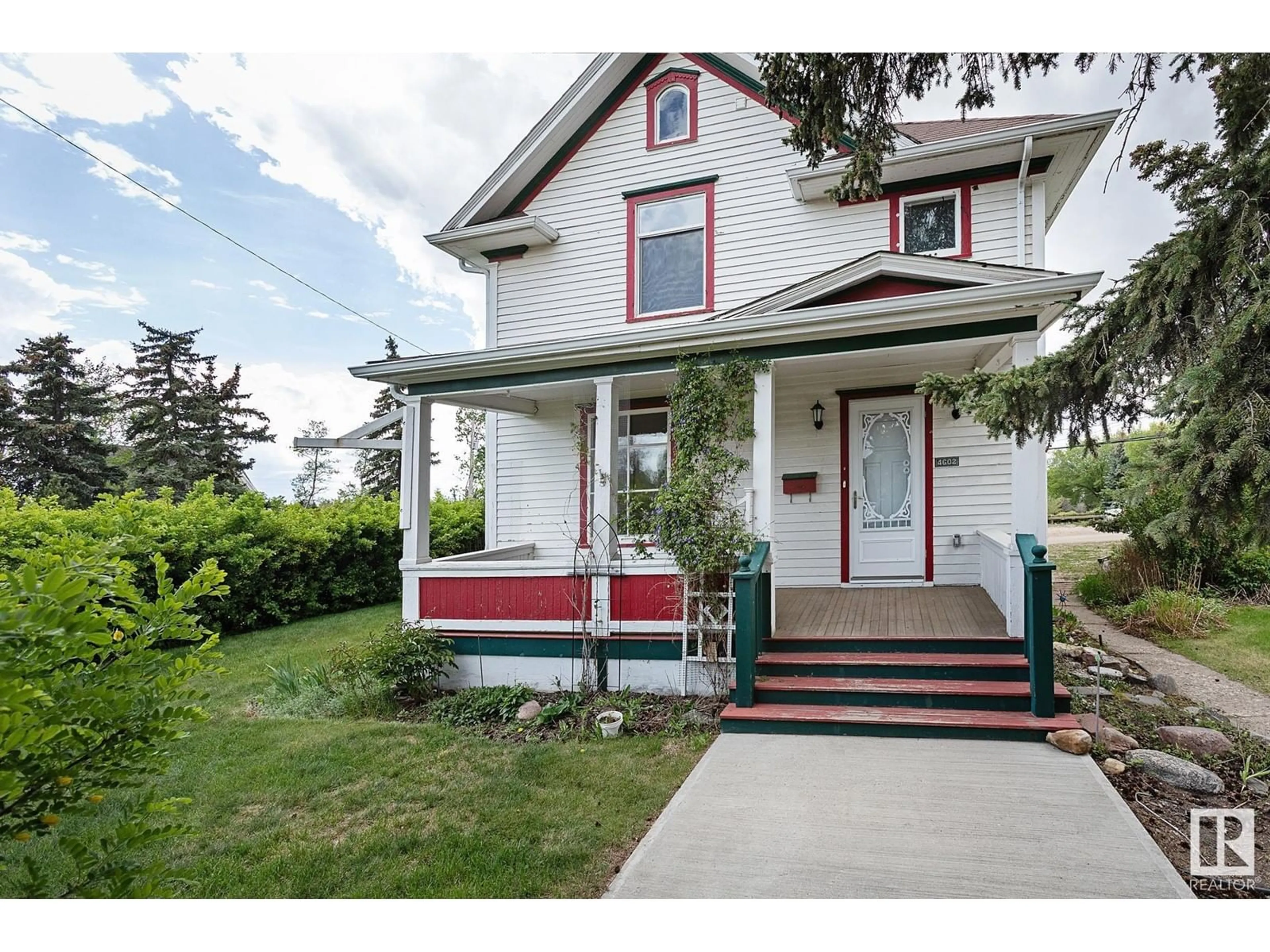 Home with vinyl exterior material, street for 4602 49 ST, Camrose Alberta T4V1M5