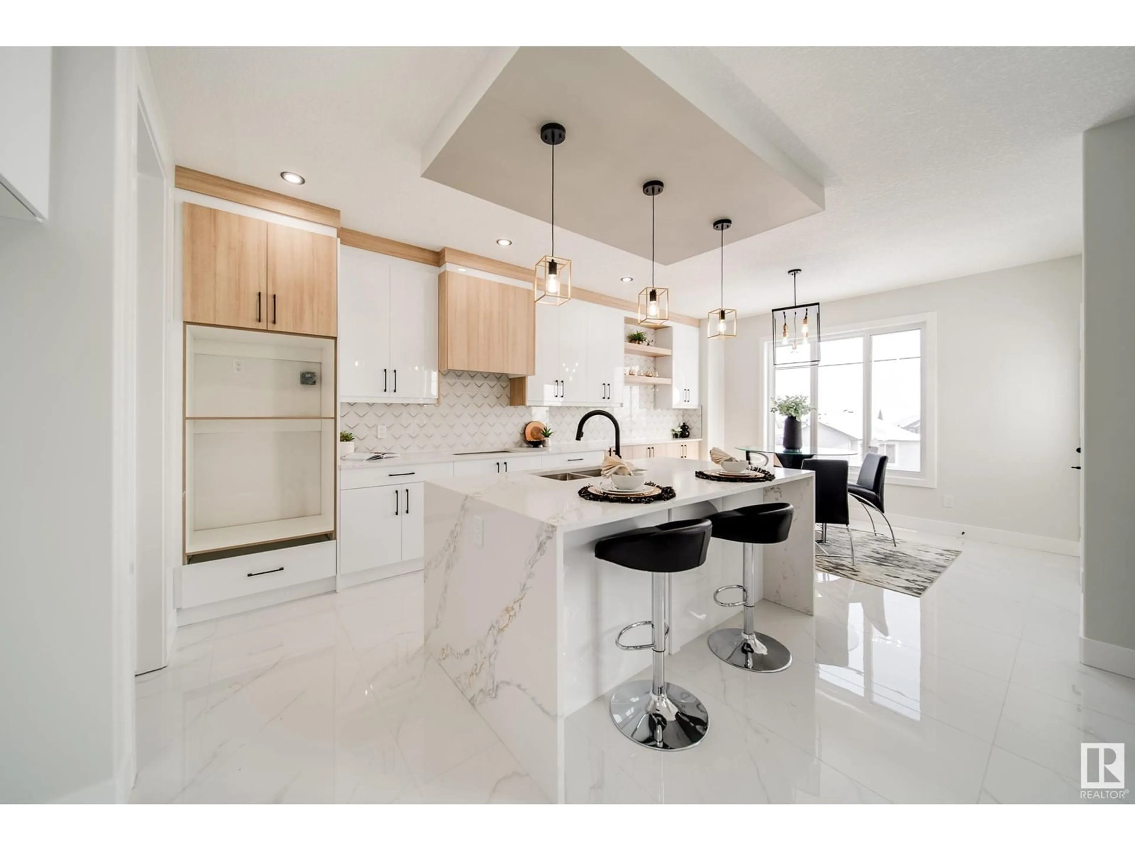 Open concept kitchen, ceramic/tile floor for 17039 45 ST, Edmonton Alberta T5Y4C9