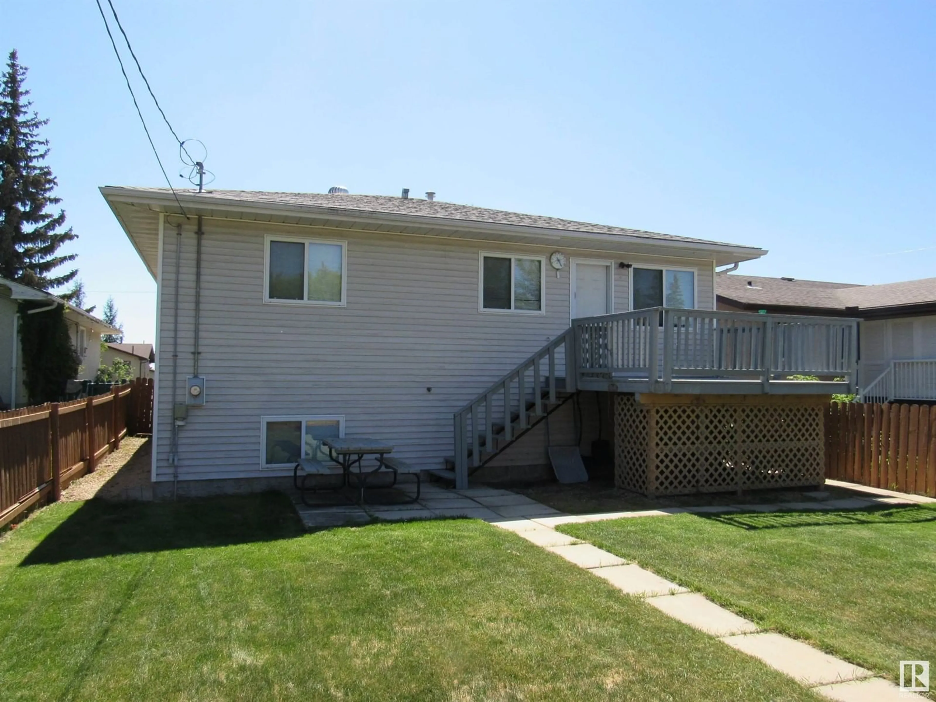 Home with vinyl exterior material, street for 4508 52 AV, Barrhead Alberta T7N1J1