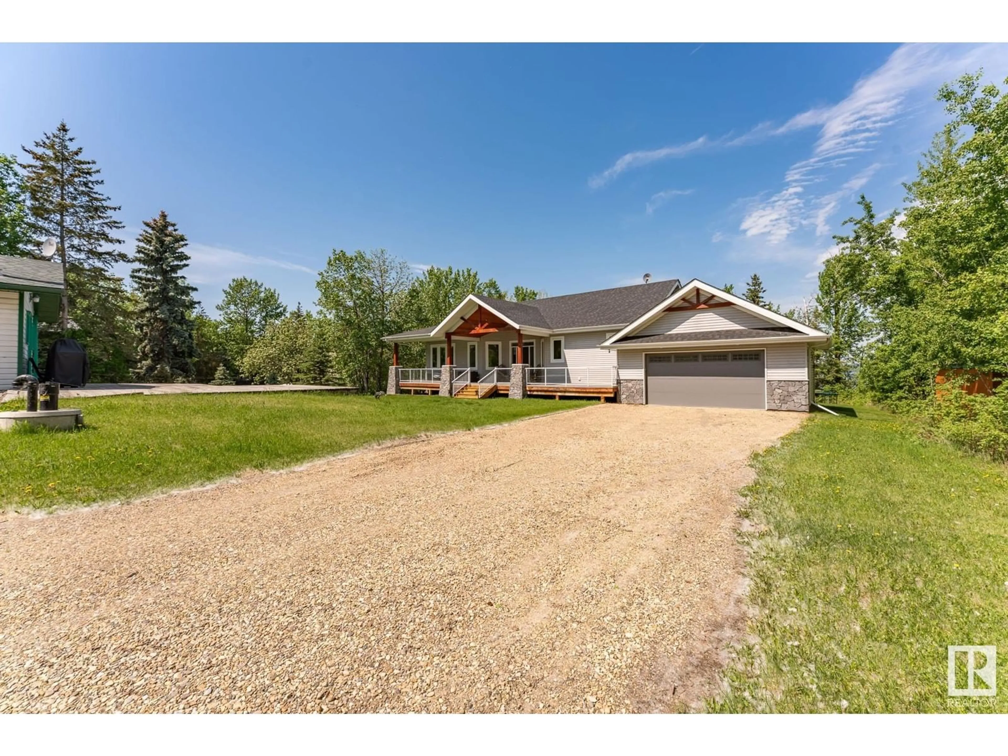 A pic from outside/outdoor area/front of a property/back of a property/a pic from drone, street for 46 RGE ROAD 53, Rural Parkland County Alberta T0E2B0