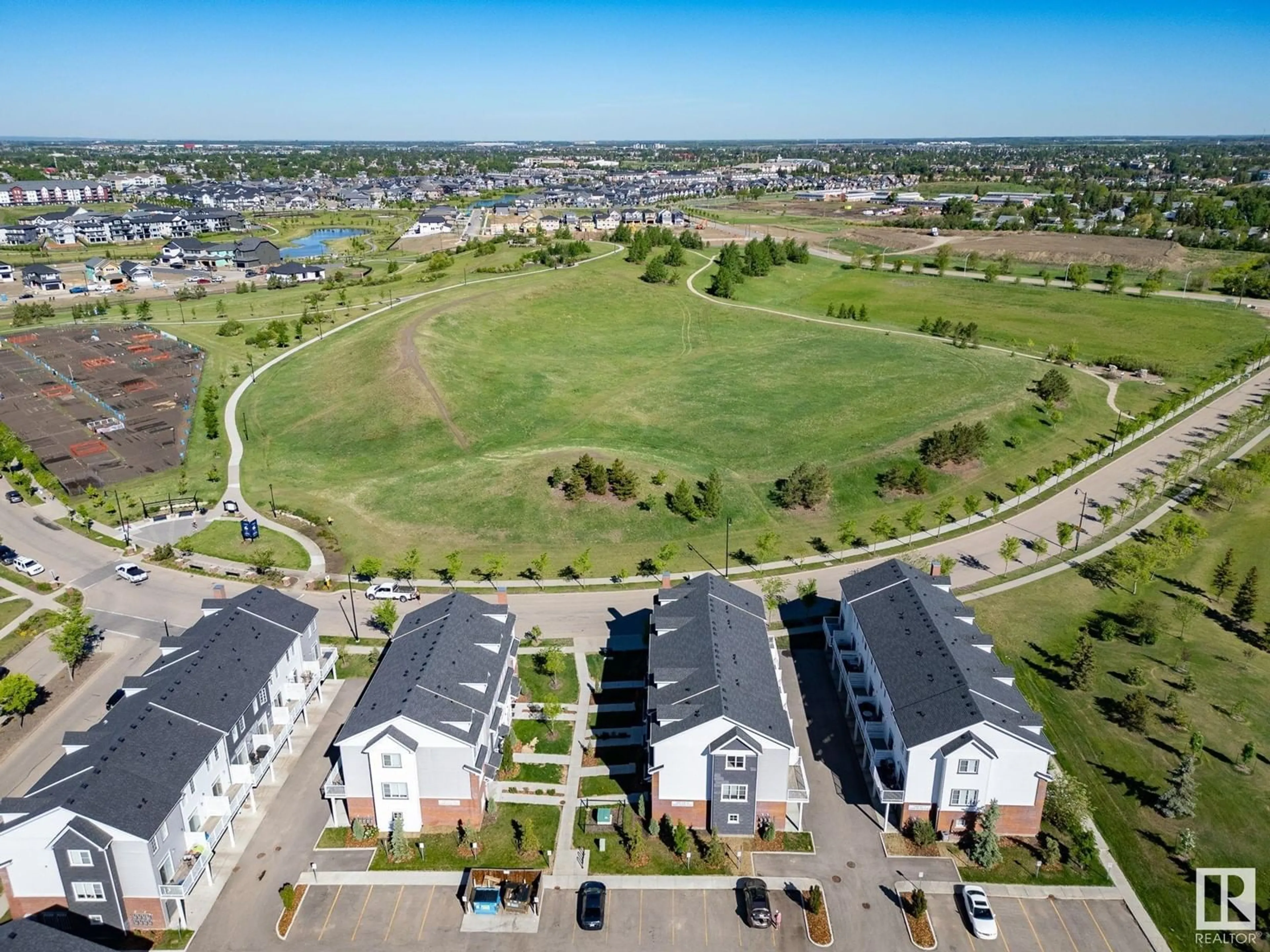 A pic from outside/outdoor area/front of a property/back of a property/a pic from drone, street for #8 - 1636 KERR RD, Edmonton Alberta T5E6W3