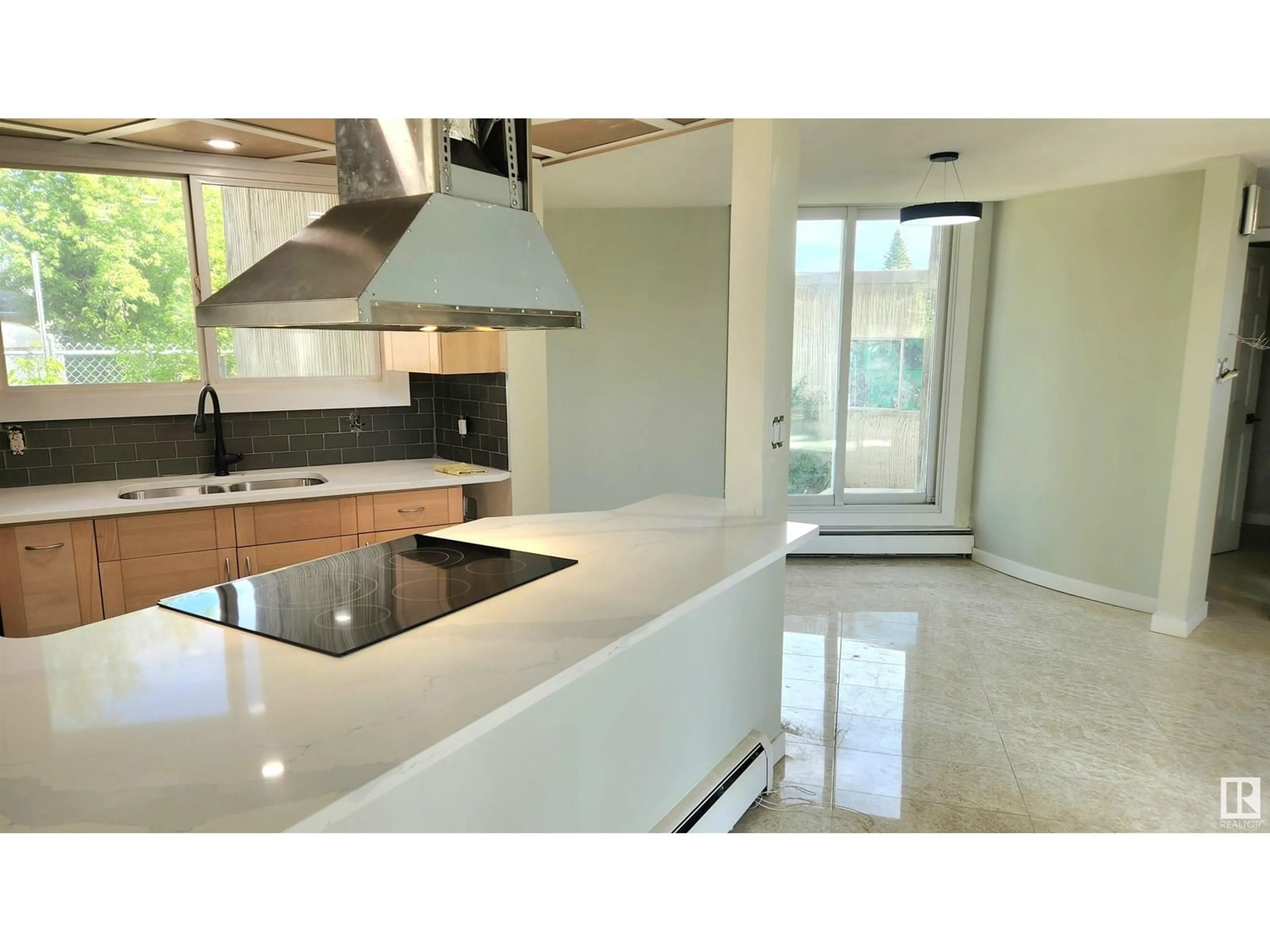 Open concept kitchen, ceramic/tile floor for NW - 9535 147 AV, Edmonton Alberta T5E2K5
