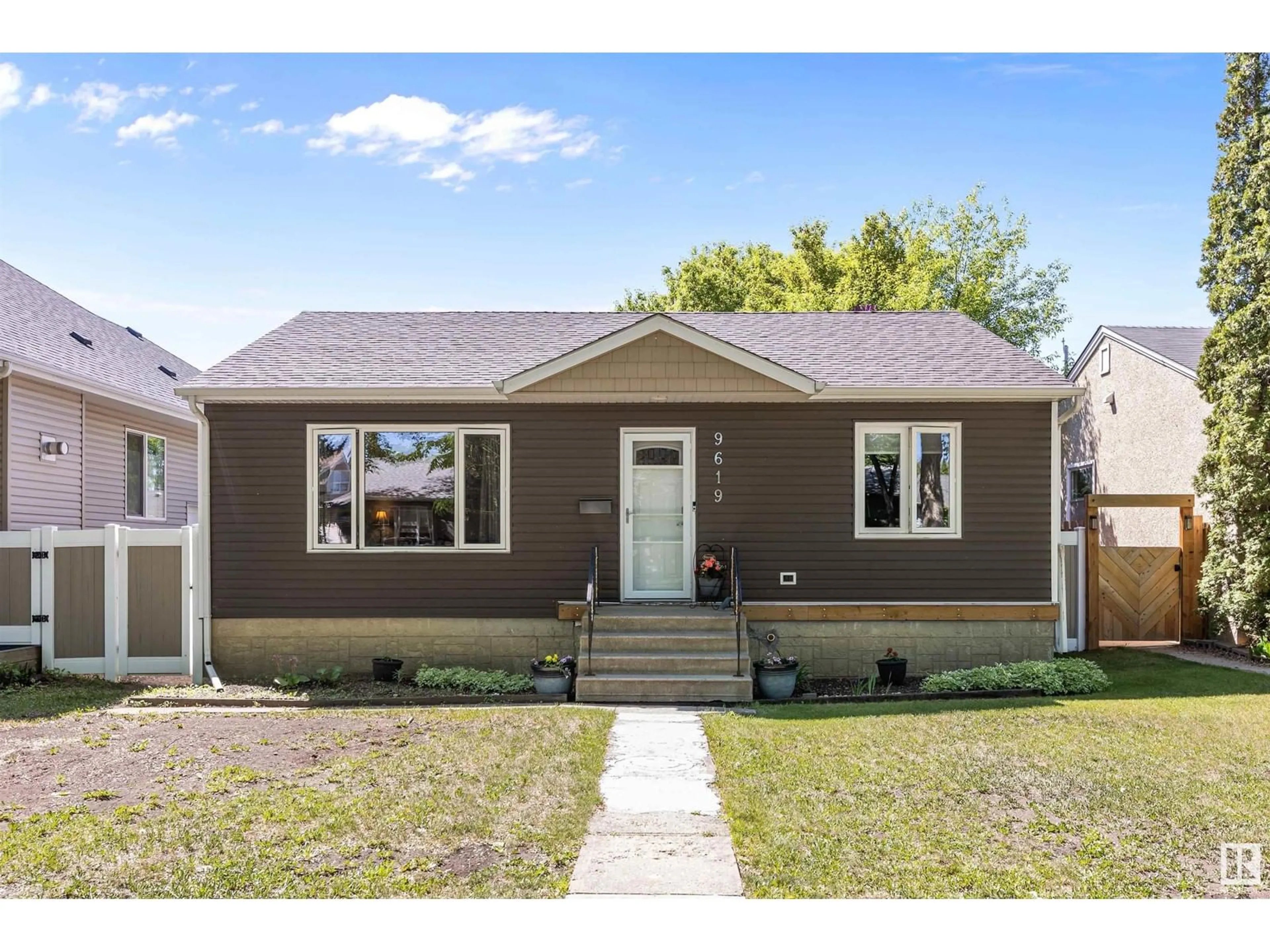 Home with vinyl exterior material, street for NW - 9619 65 AV, Edmonton Alberta T6E0K4