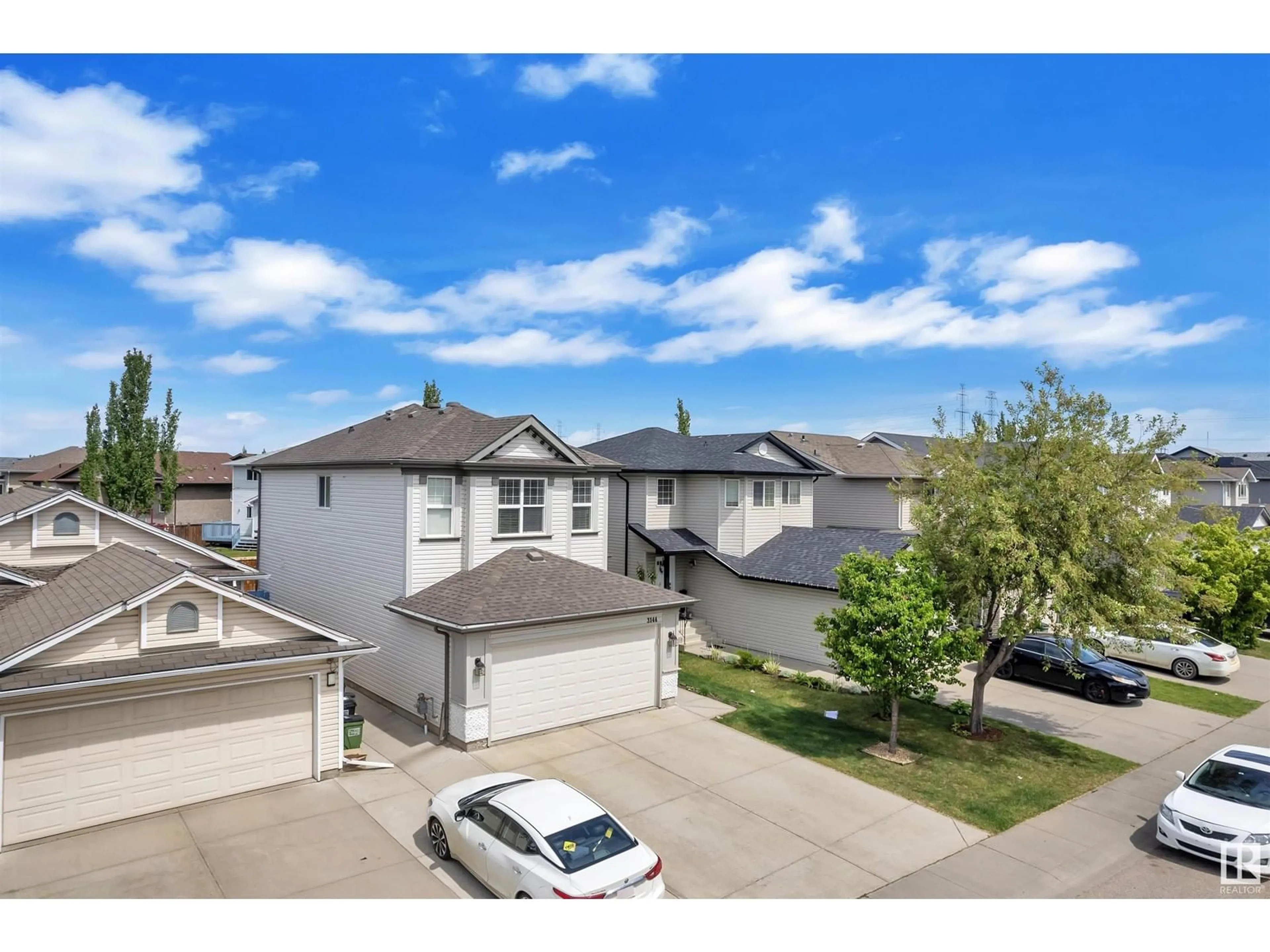A pic from outside/outdoor area/front of a property/back of a property/a pic from drone, street for NW - 3144 25 AV, Edmonton Alberta T6T0C8