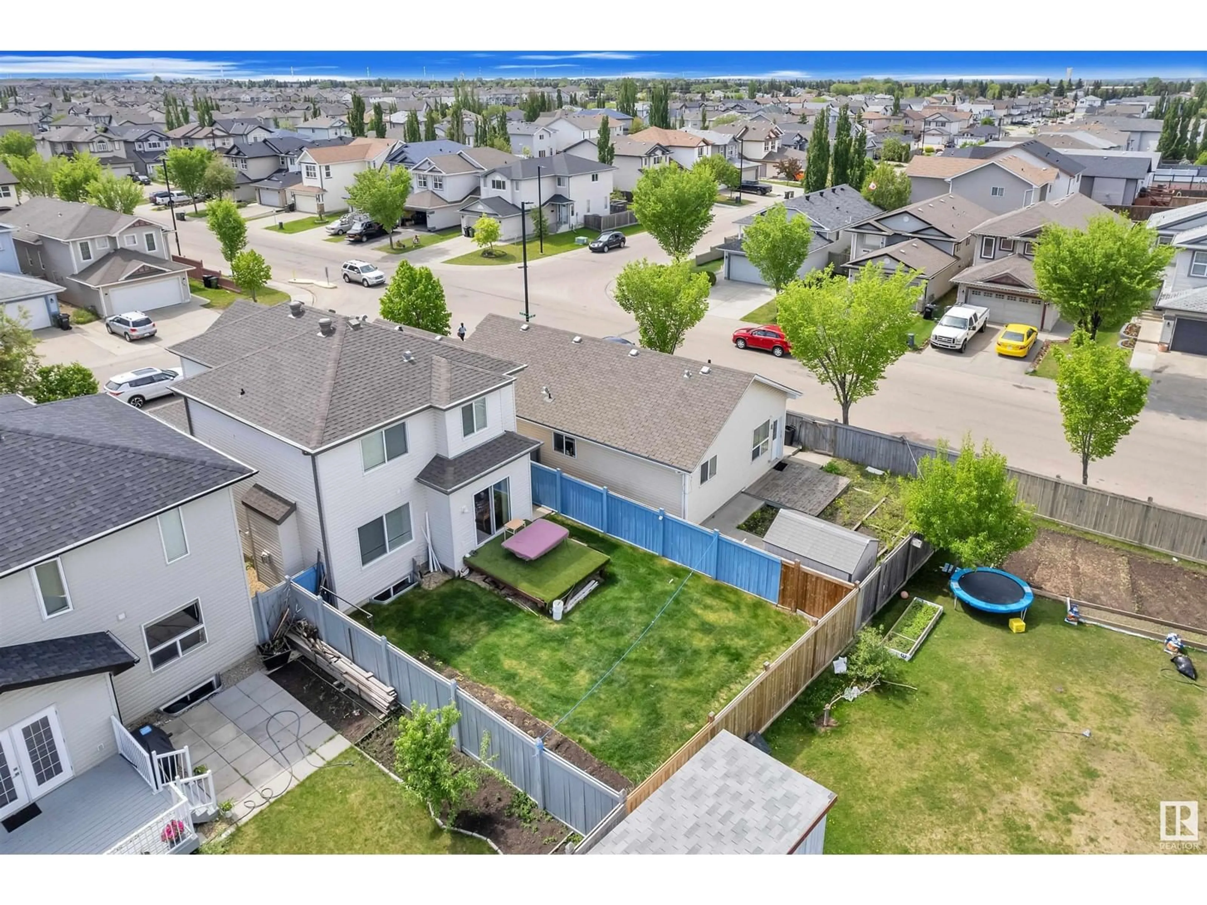 A pic from outside/outdoor area/front of a property/back of a property/a pic from drone, mountain view for NW - 3144 25 AV, Edmonton Alberta T6T0C8