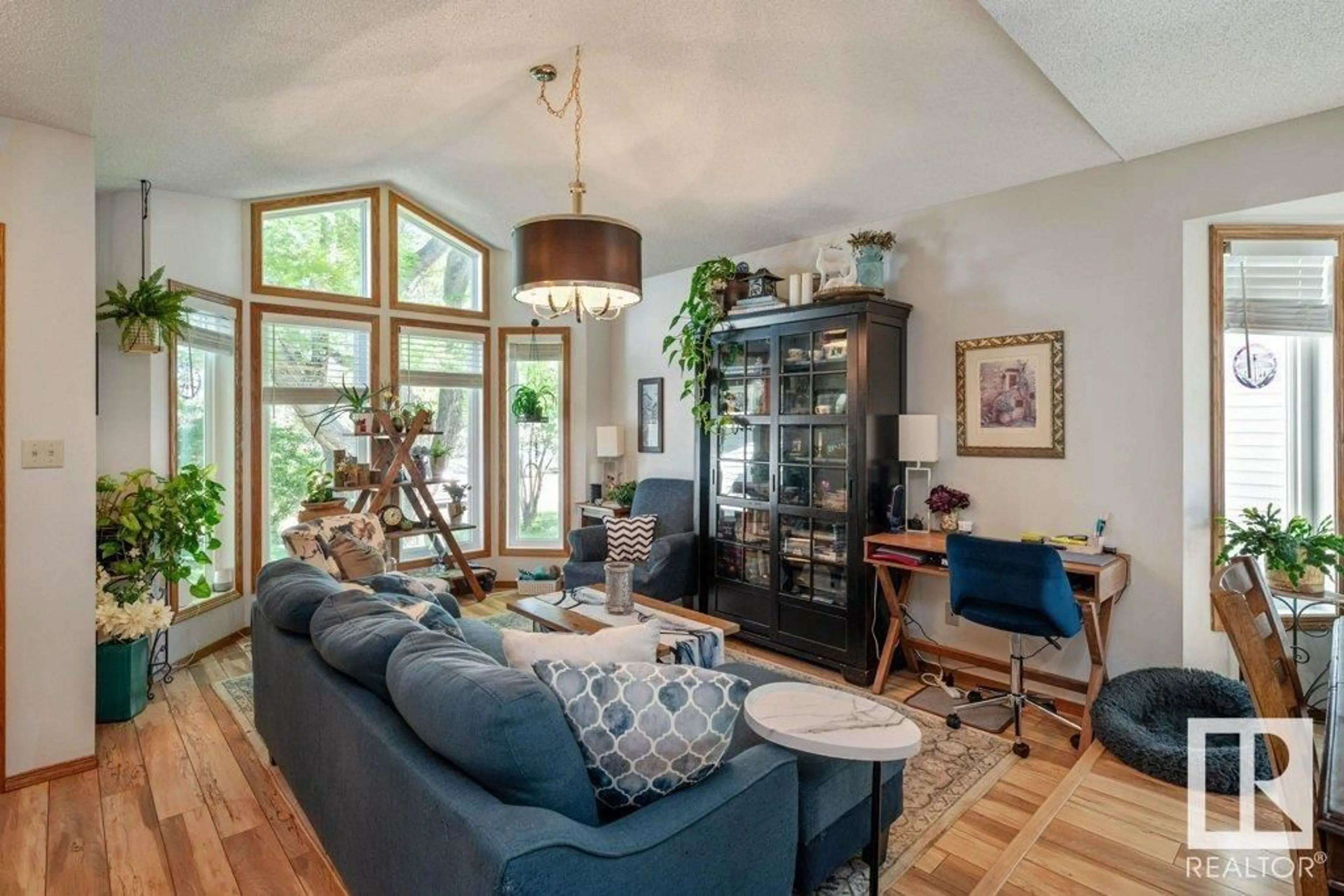 Living room with furniture, wood/laminate floor for 5416 46 ST, Stony Plain Alberta T7Z1E5