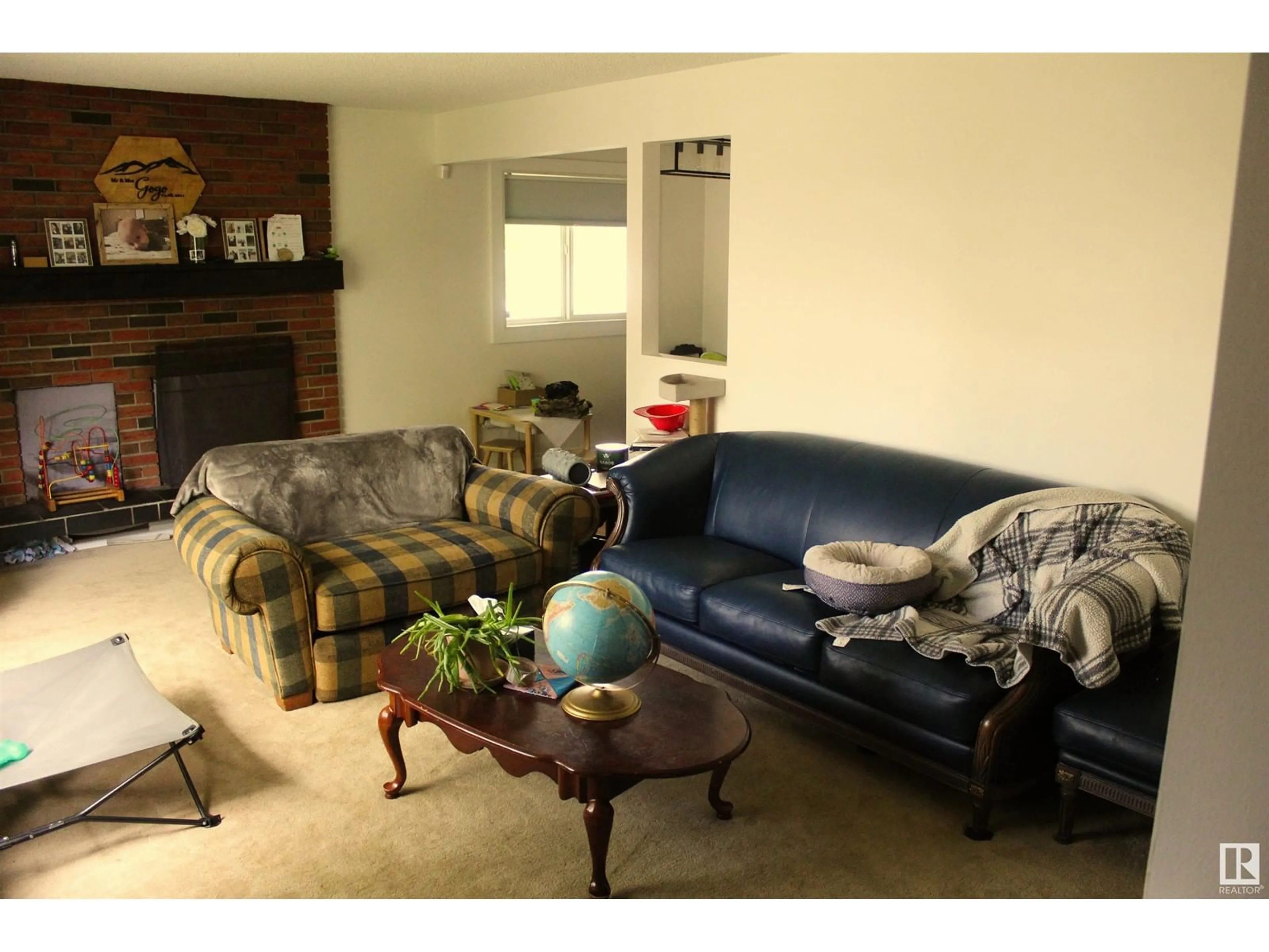Living room with furniture, unknown for 4921 47 AVE, Legal Alberta T0G1L0
