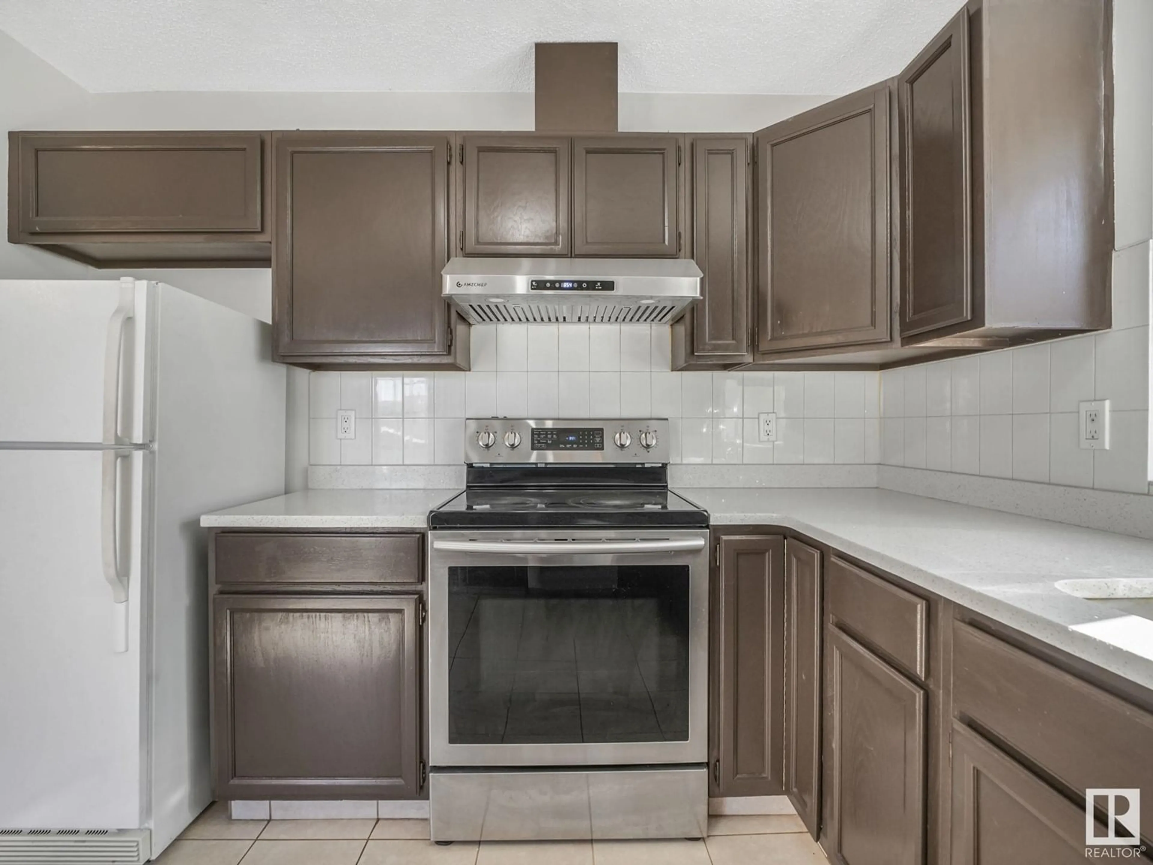 Standard kitchen, ceramic/tile floor for 3907 20 AV, Edmonton Alberta T6L5G3