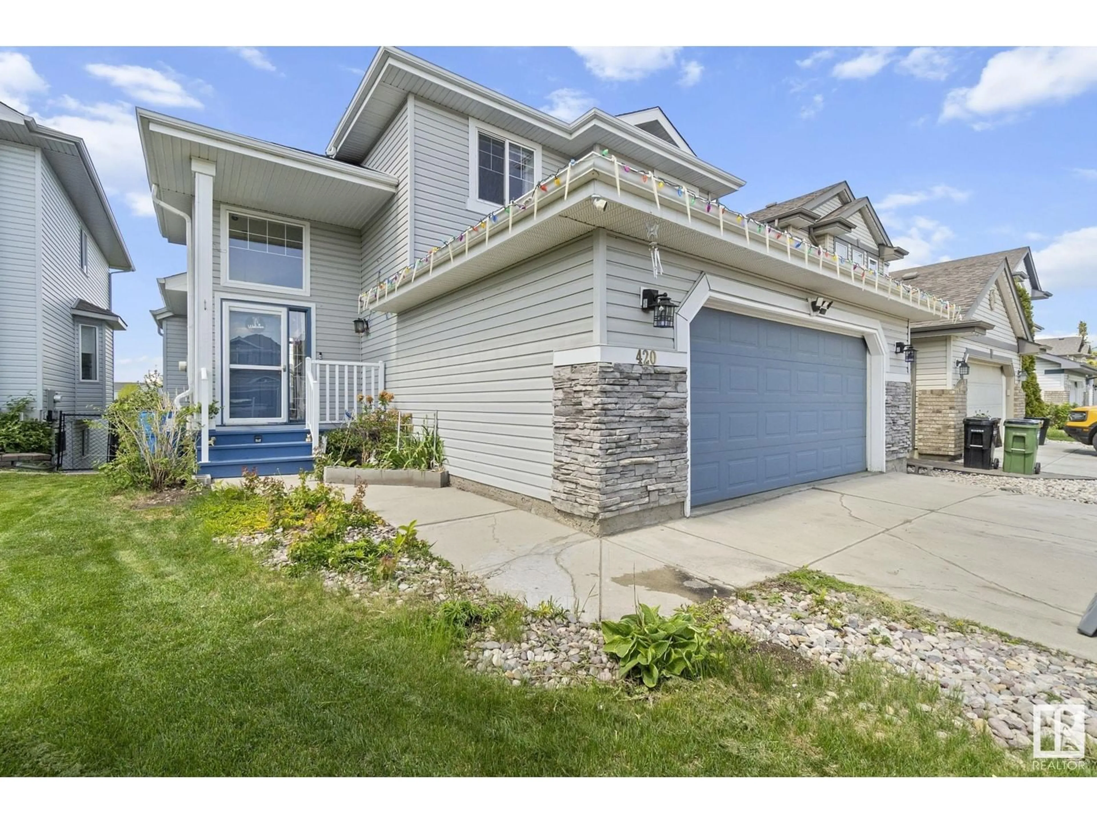 Home with vinyl exterior material, street for 420 86 ST, Edmonton Alberta T6X1A3