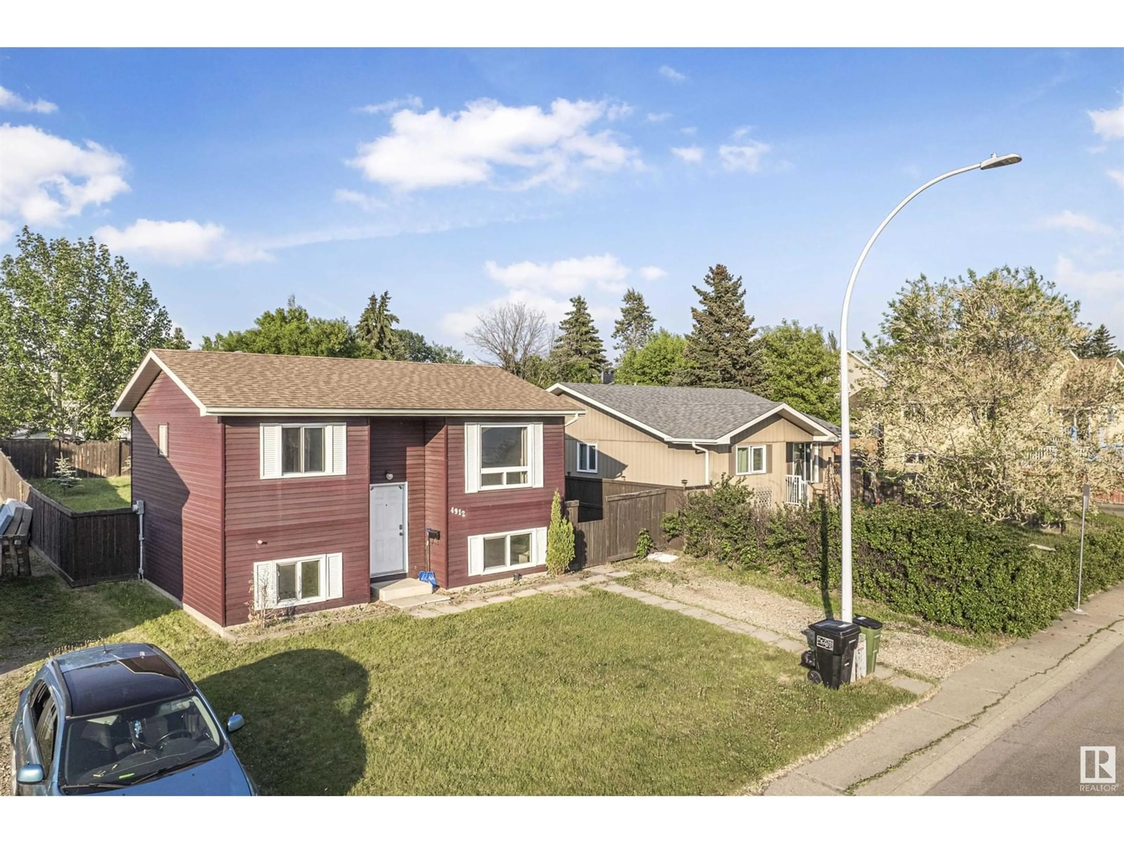 A pic from outside/outdoor area/front of a property/back of a property/a pic from drone, street for 4912 36 AV, Edmonton Alberta T6L3S5