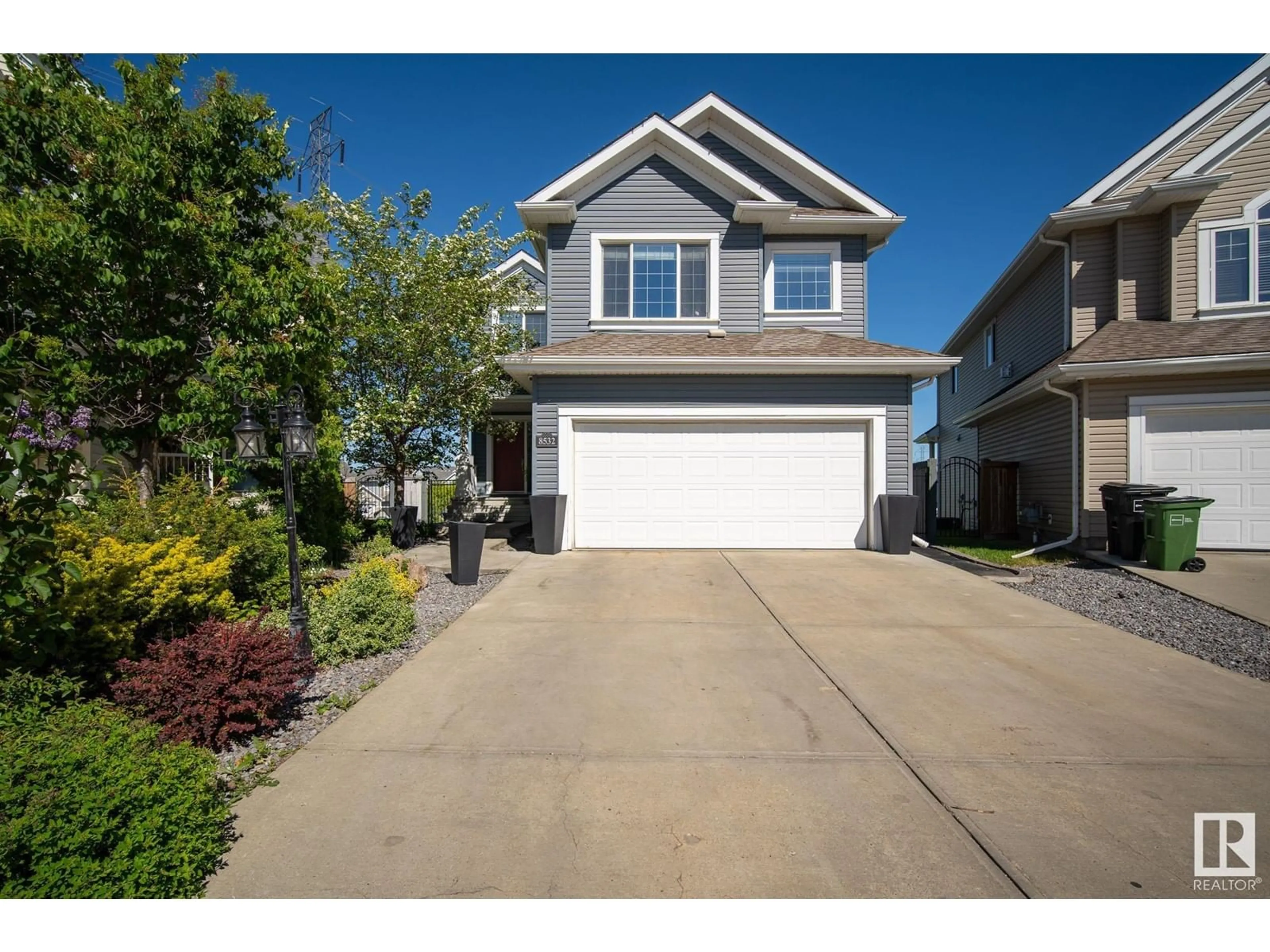 Home with vinyl exterior material, street for SW - 8532 16A AV, Edmonton Alberta T6X0H9
