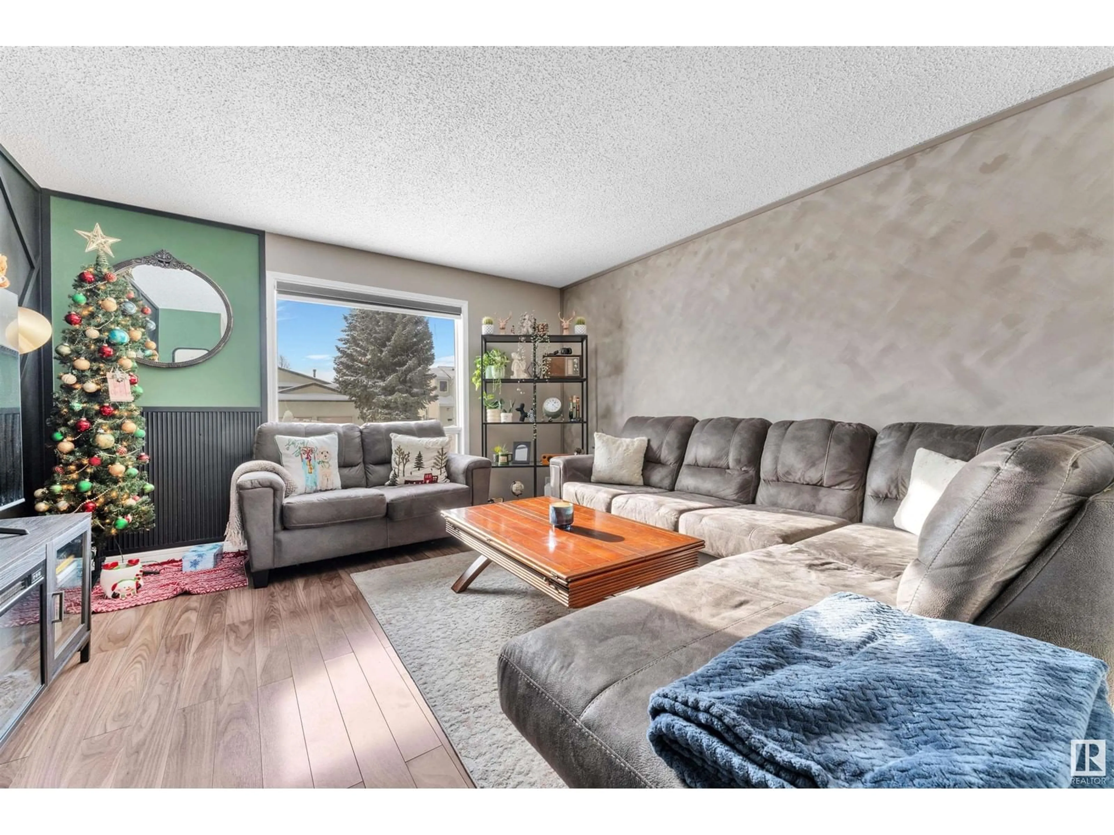 Living room with furniture, unknown for 3552 12A AV, Edmonton Alberta T6L3L5