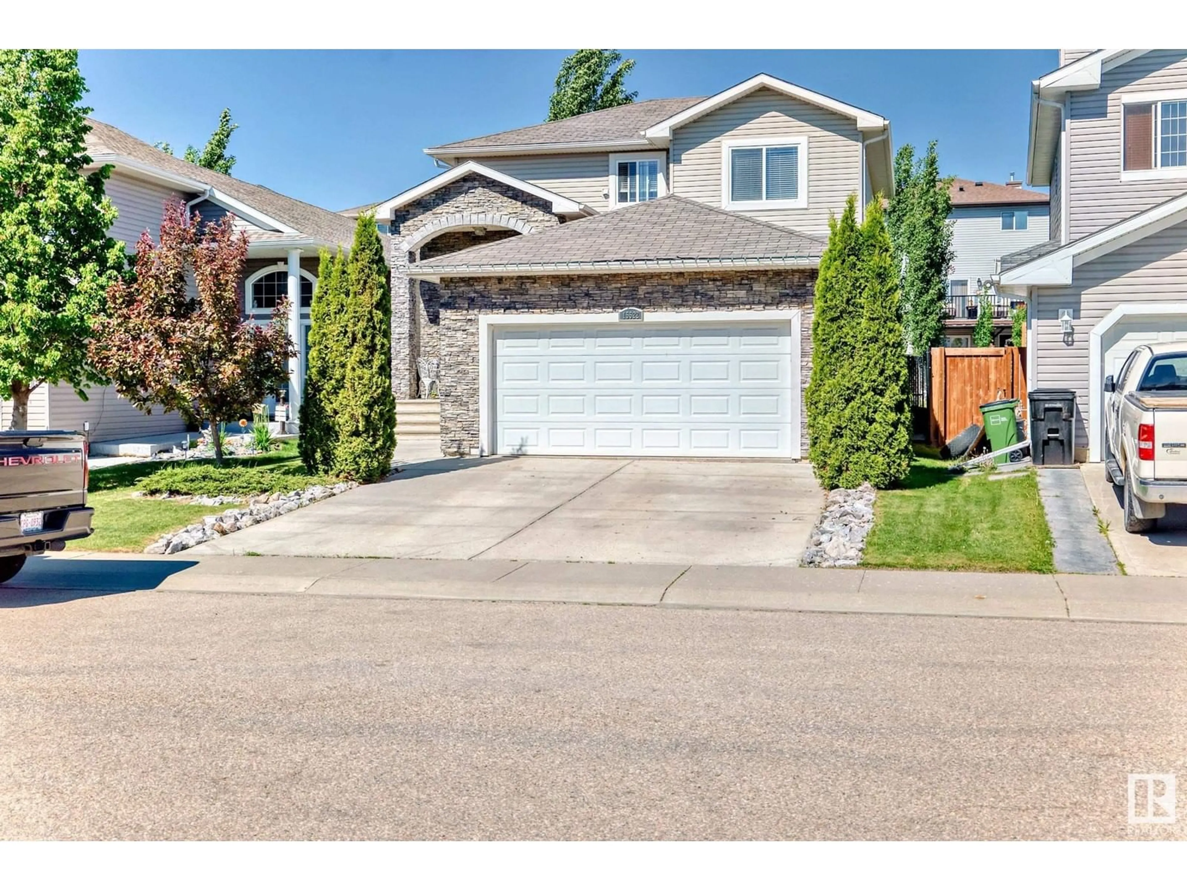 Home with vinyl exterior material, street for 15522 47A ST, Edmonton Alberta T5Y0B6