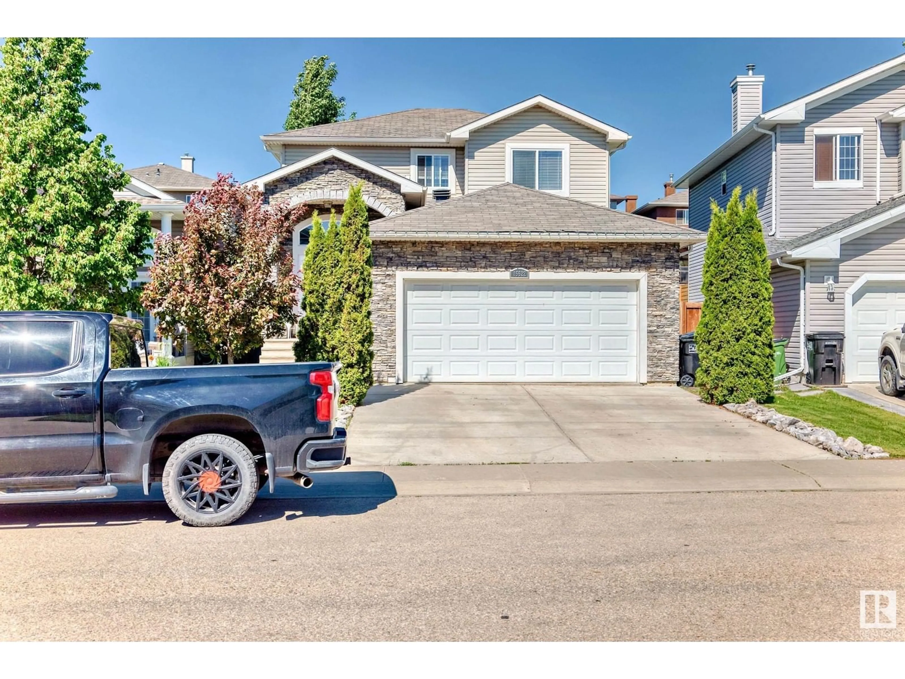 Home with vinyl exterior material, street for 15522 47A ST, Edmonton Alberta T5Y0B6