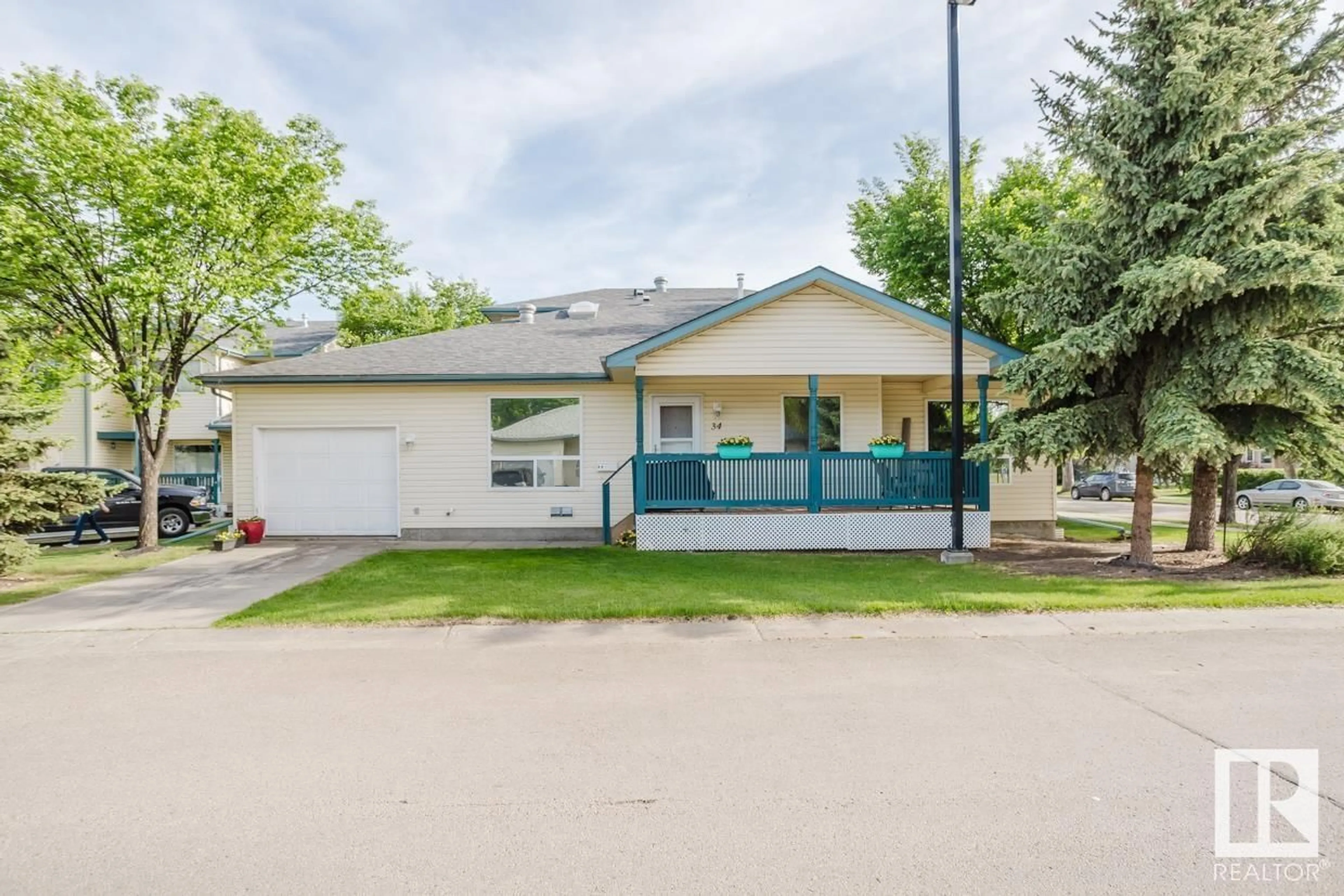 Home with vinyl exterior material, street for #34 - 10909 106 ST NW, Edmonton Alberta T5H4M7