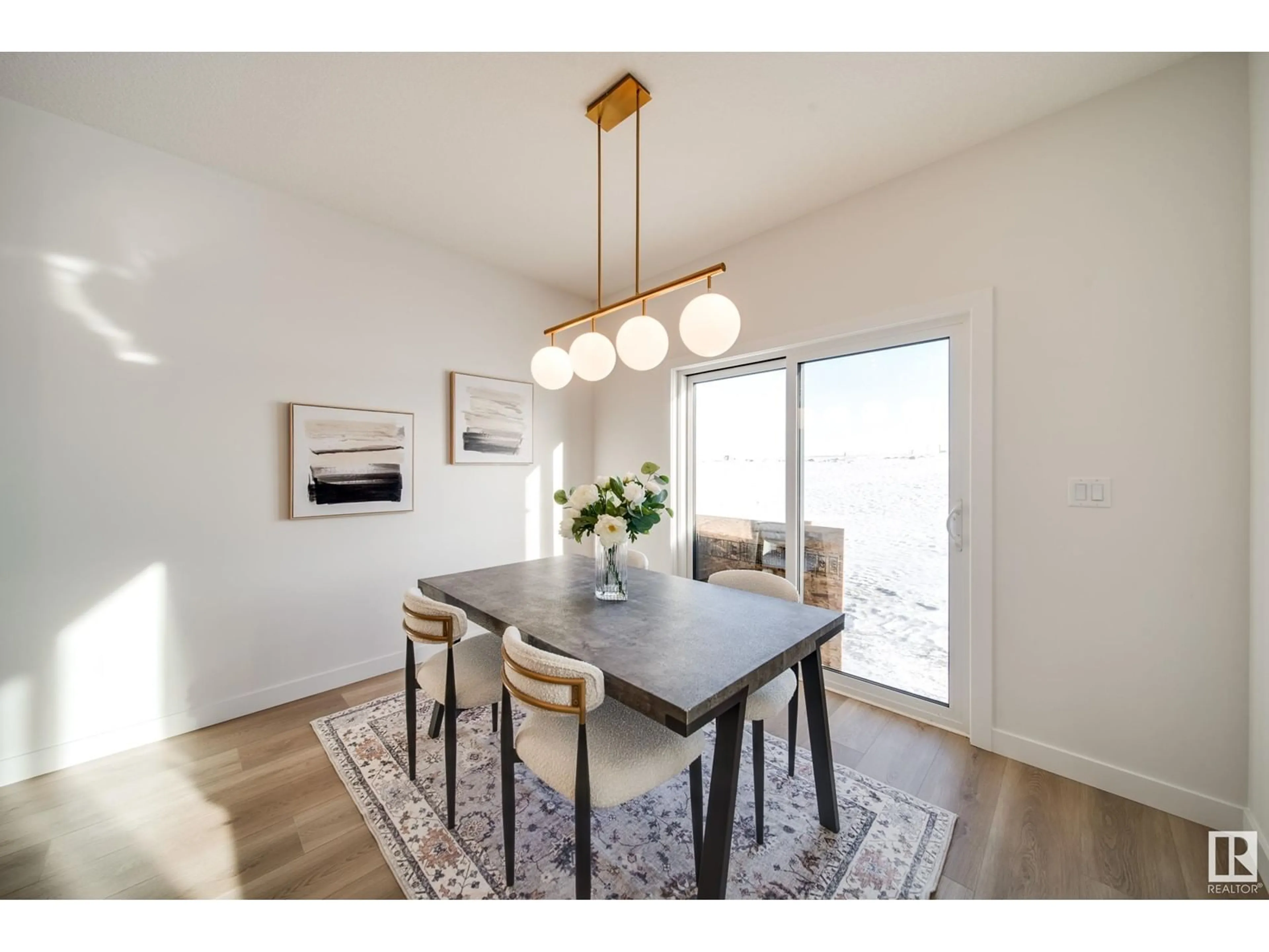 Dining room, wood/laminate floor for 1 CLOUTIER CL, St. Albert Alberta T8T2C9