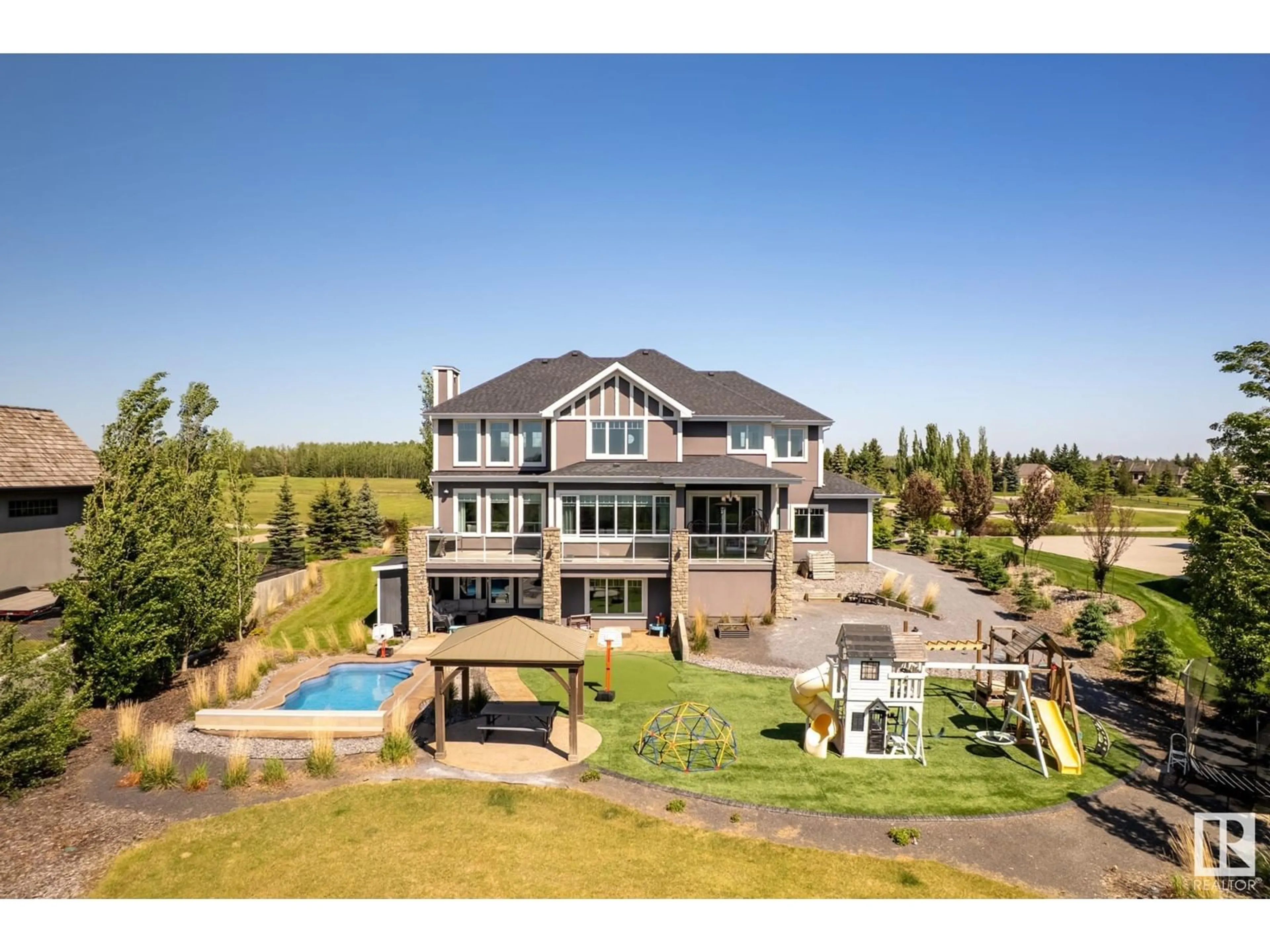 A pic from outside/outdoor area/front of a property/back of a property/a pic from drone, water/lake/river/ocean view for 25515 - 27 TWP ROAD 511 A, Rural Parkland County Alberta T7Y1A8