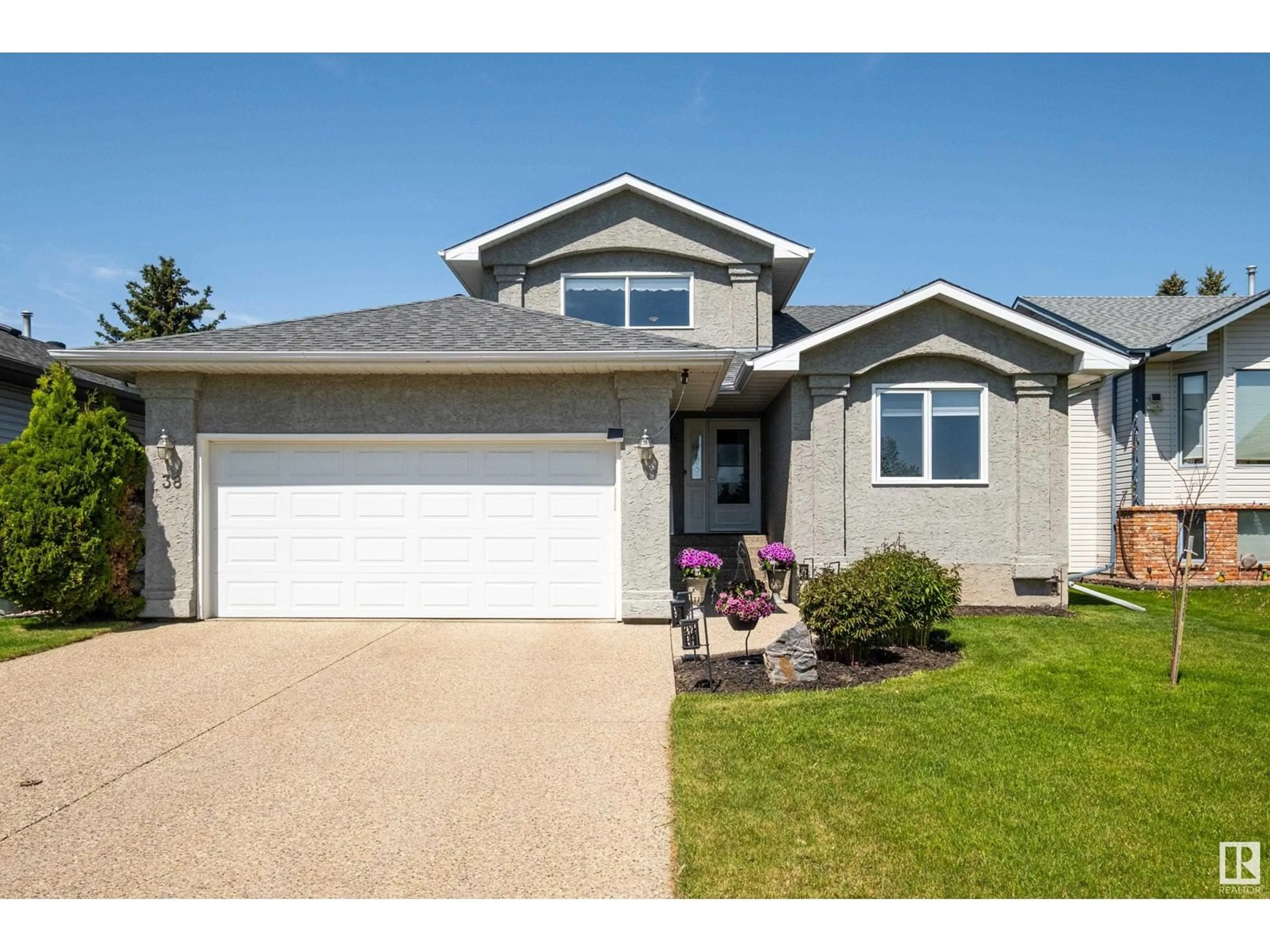 Home with vinyl exterior material, street for 38 FAIRWAY DR, Spruce Grove Alberta T7X2K3